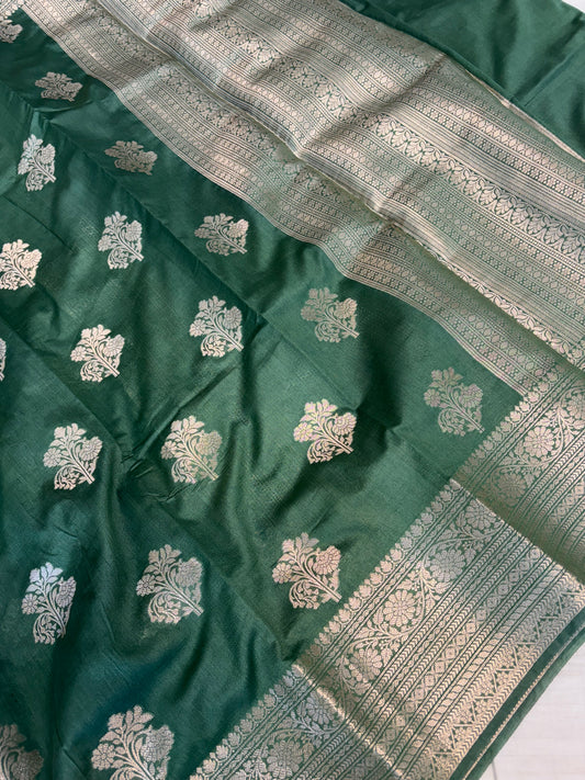 Banarasi soft katan silk saree in bottle green colour