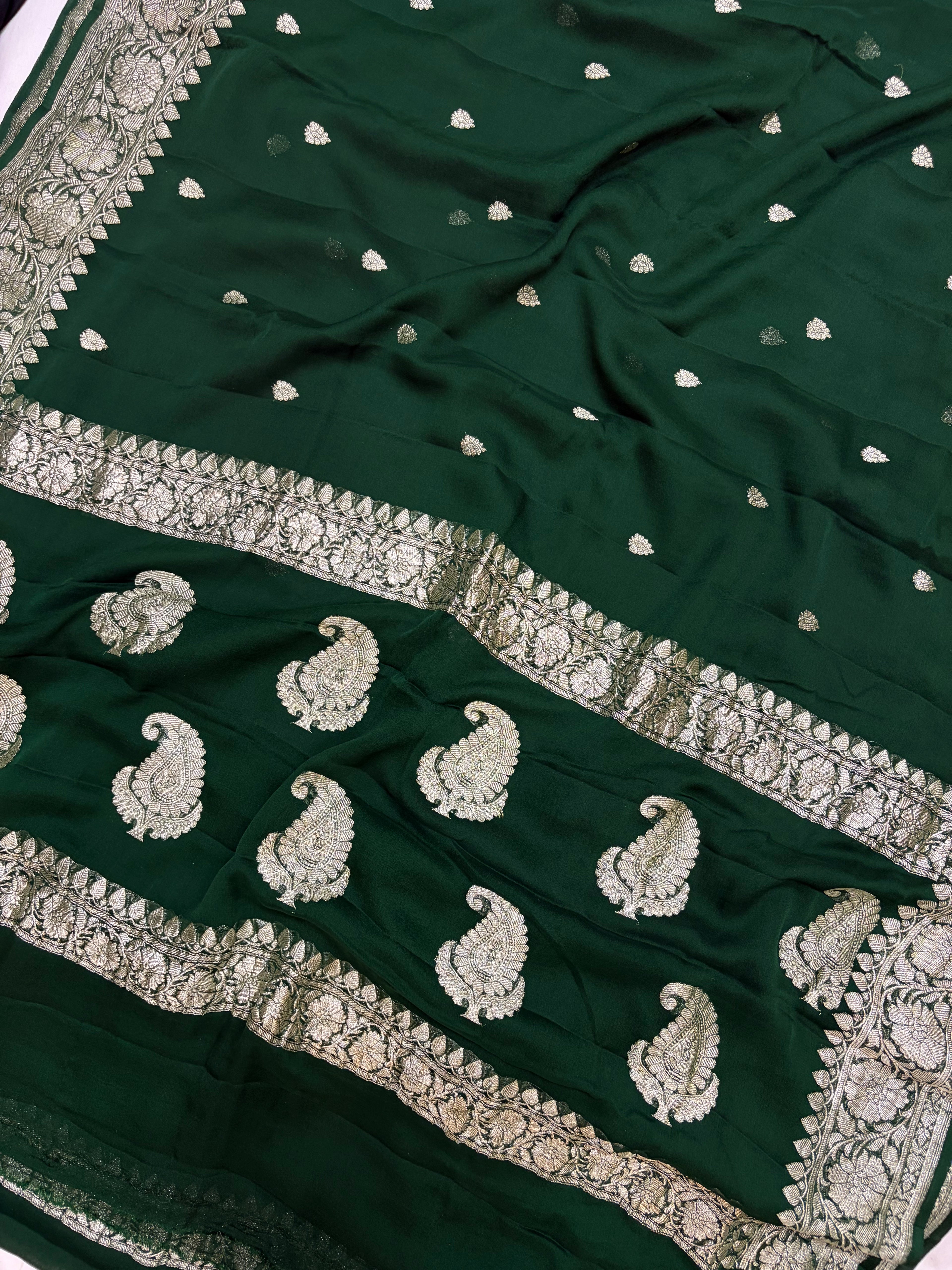 Pure Banarasi Khaddi Chiffon Zari Border Saree in bottle green colour