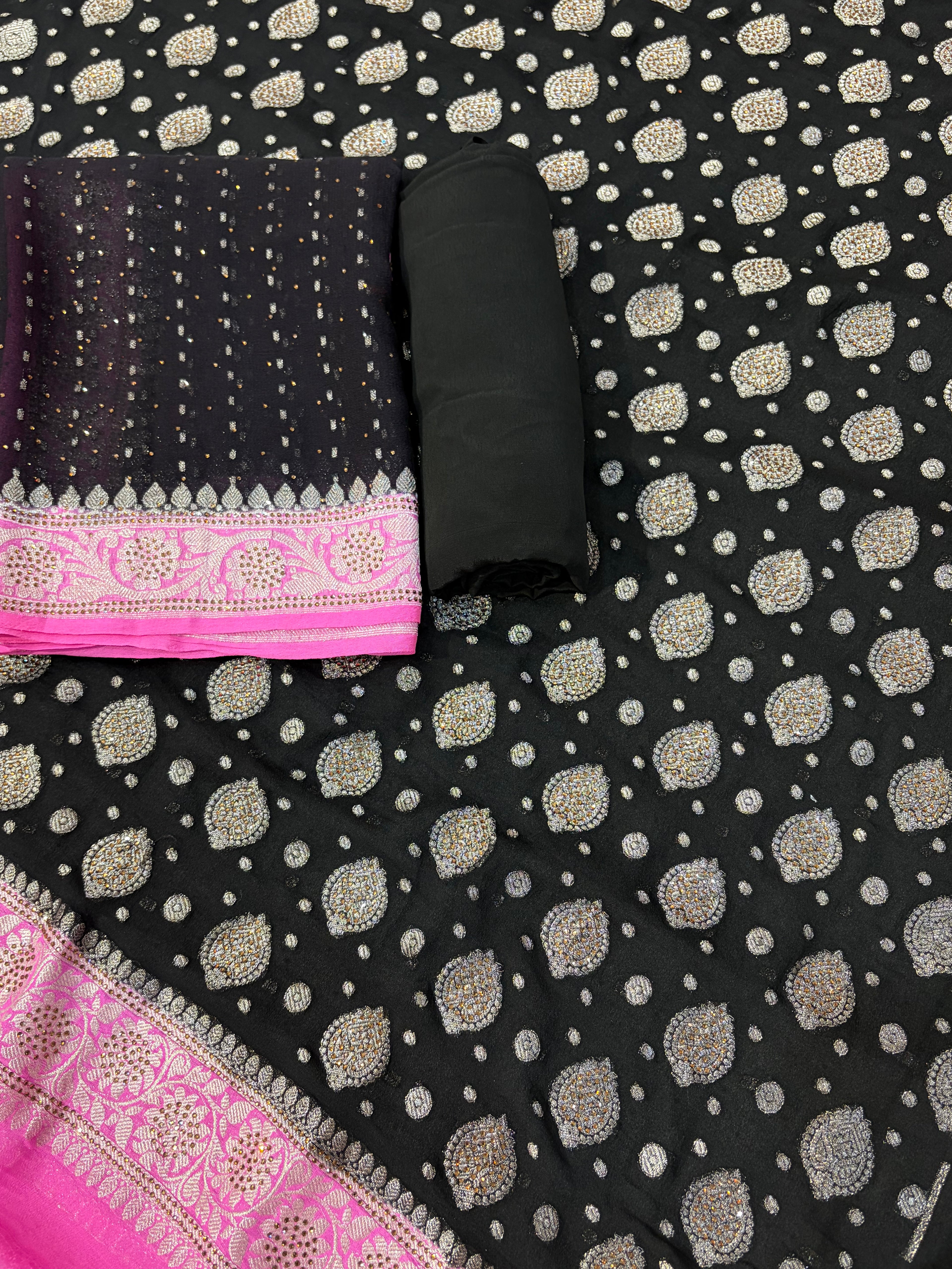 Pure khaddi chiffon suit in black with pink colour with all over swaroski work