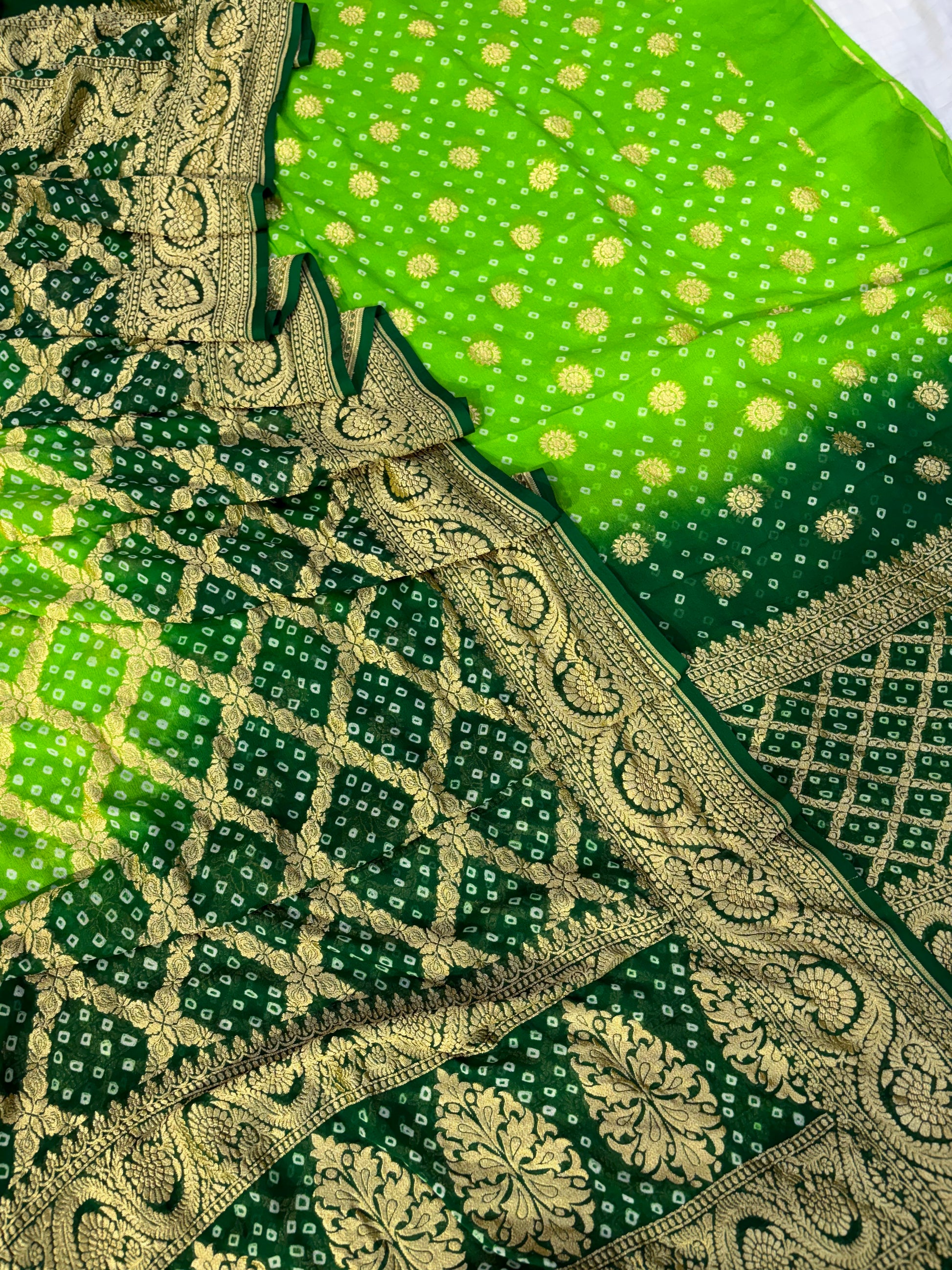 Pure georgette bandhani suit in parrot green with dark bottle green colour