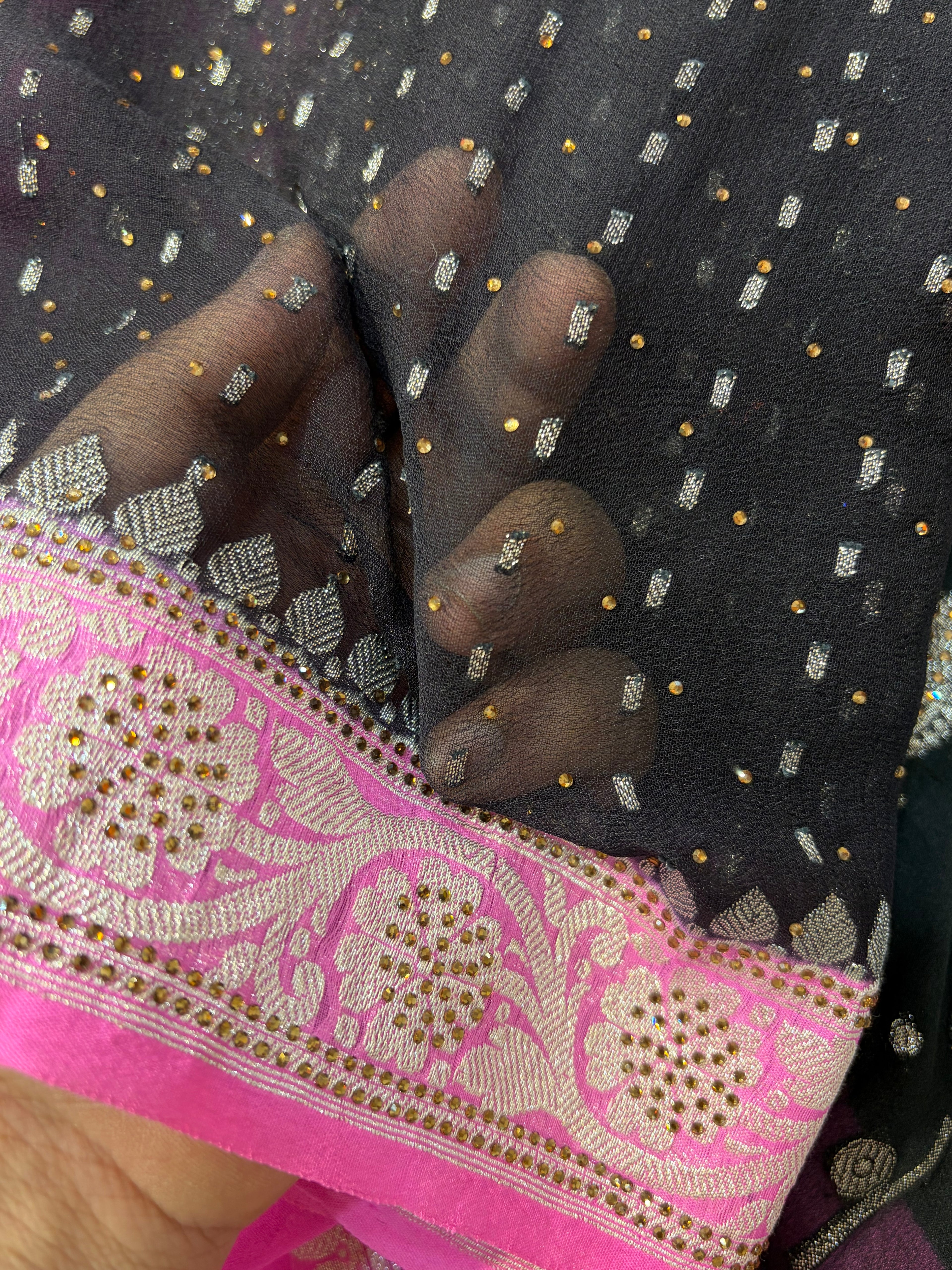 Pure khaddi chiffon suit in black with pink colour with all over swaroski work