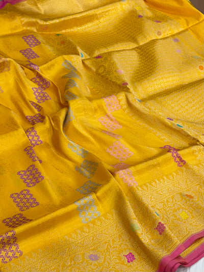 Pure katan tissue silk saree in gold colour with multiple meenakari work