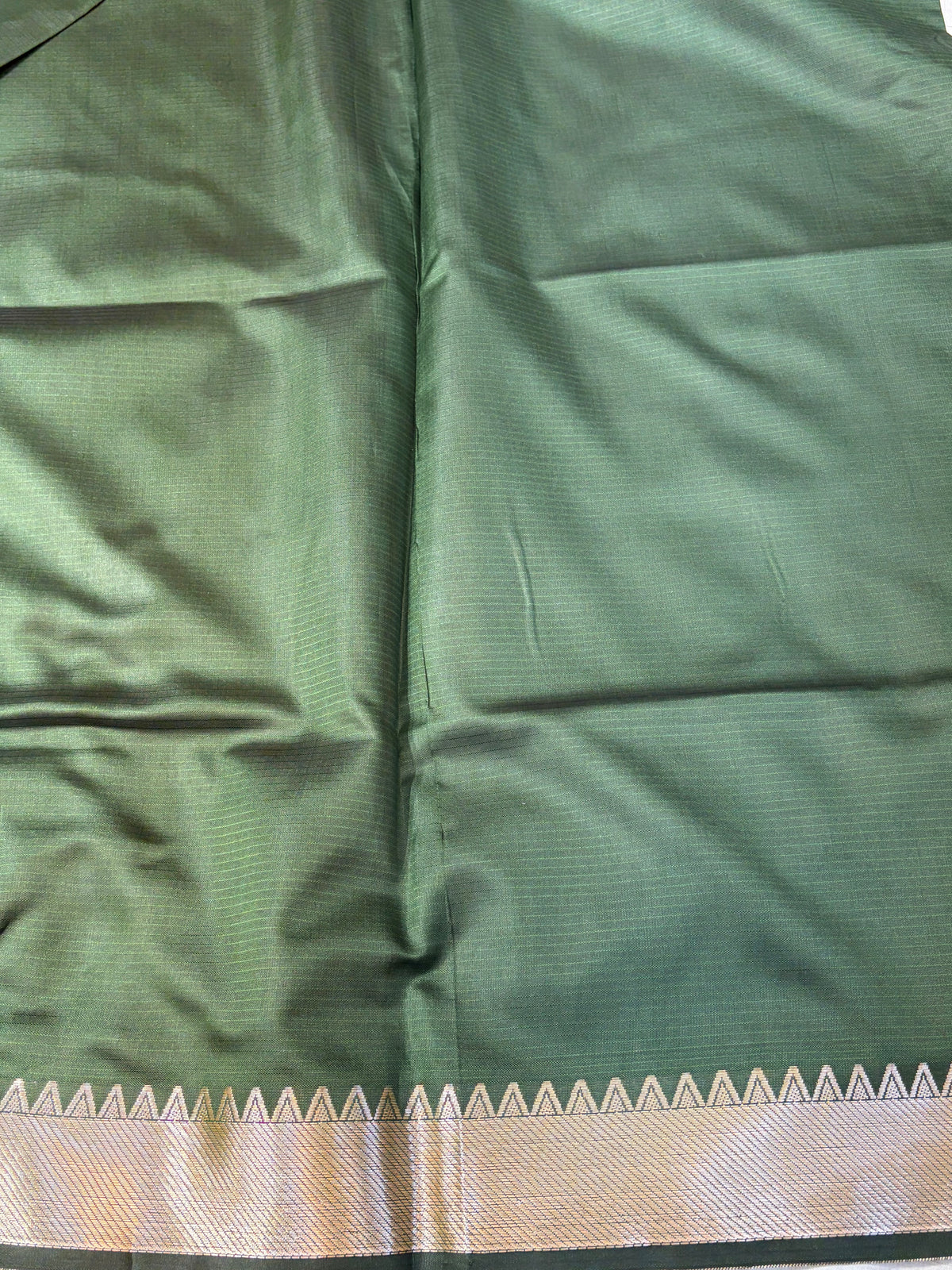 Banarasi soft silk saree in bottle  green colour