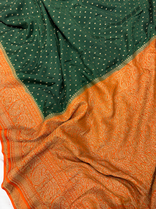 Pure khaddi crepe silk saree in bottle green bright orange colour