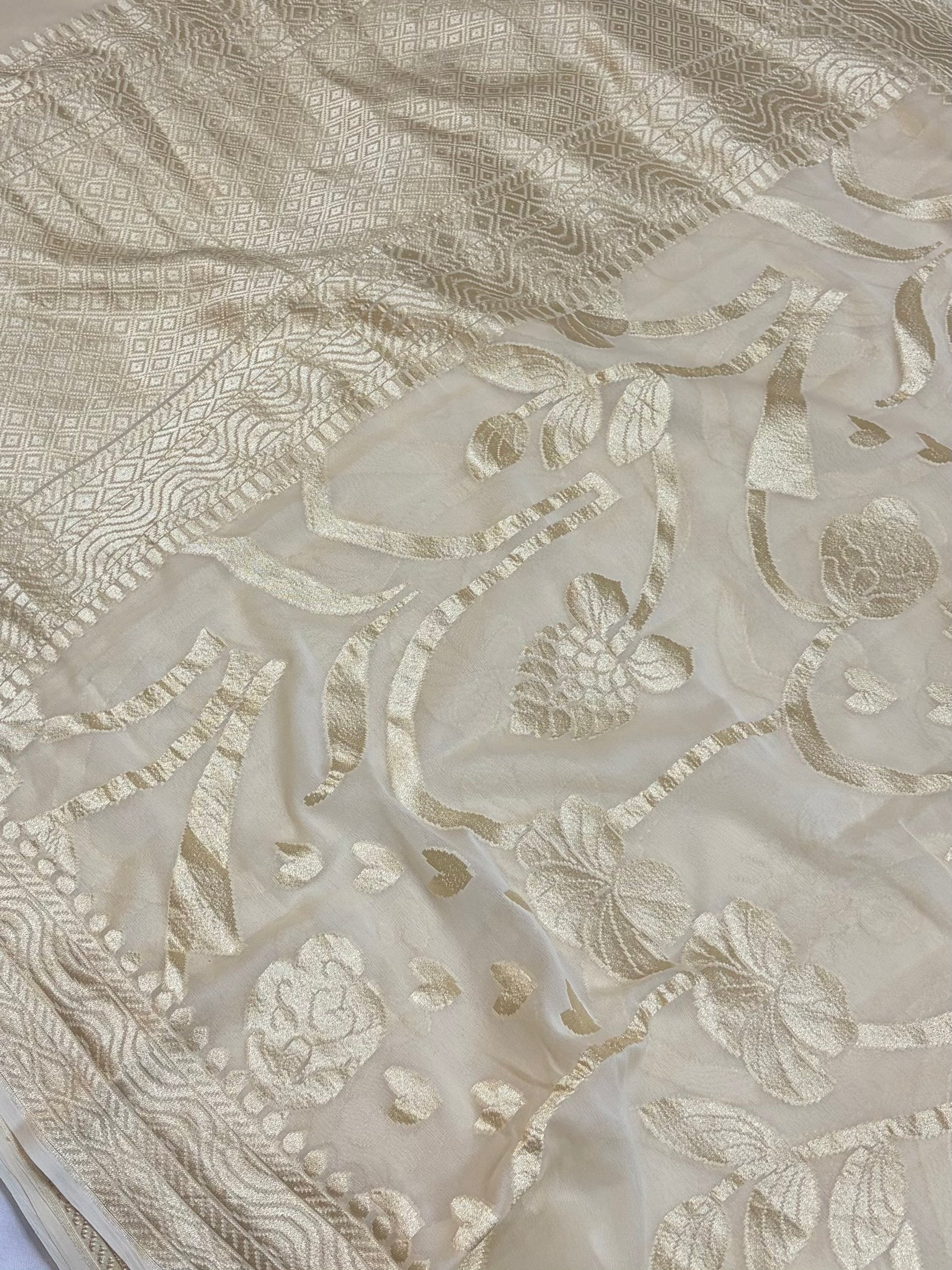 Pure georgette silk saree in pastel cream colour