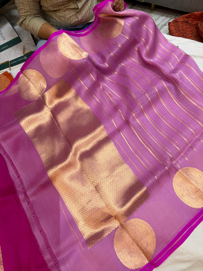 Pure handloom organza silk saree in purple colour with Rani piping border