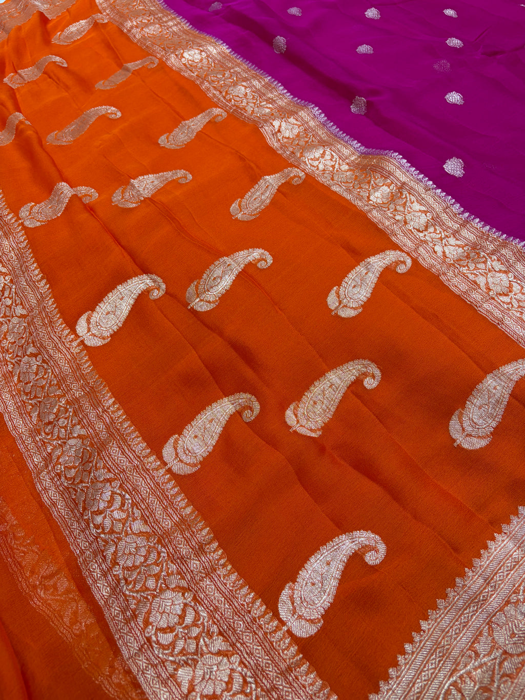 Pure khaddi chiffon saree is rani & orange colour