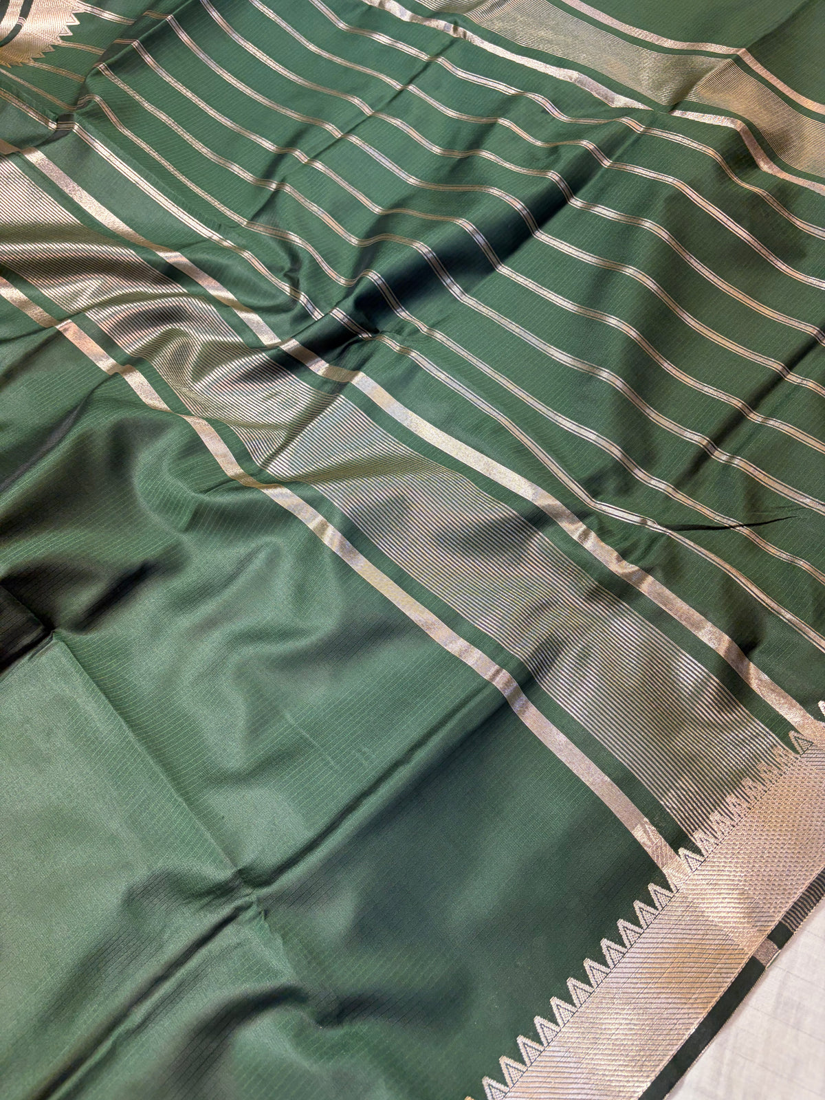 Banarasi soft silk saree in bottle  green colour