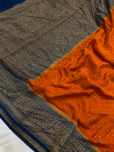 Pure khaddi crepe silk saree in Rust orange with navy blue colour