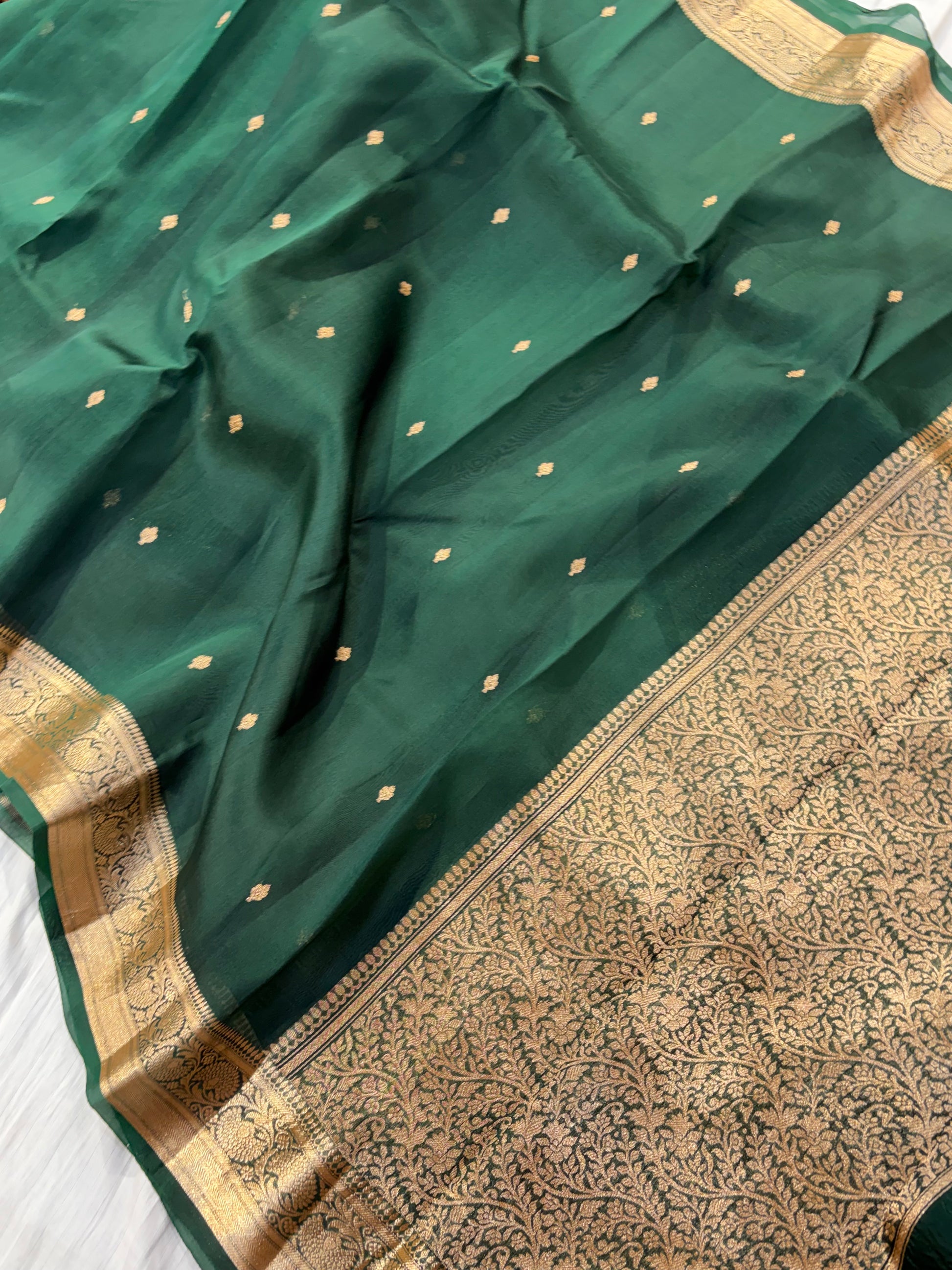 Pure handloom organza silk saree in bottle green colour