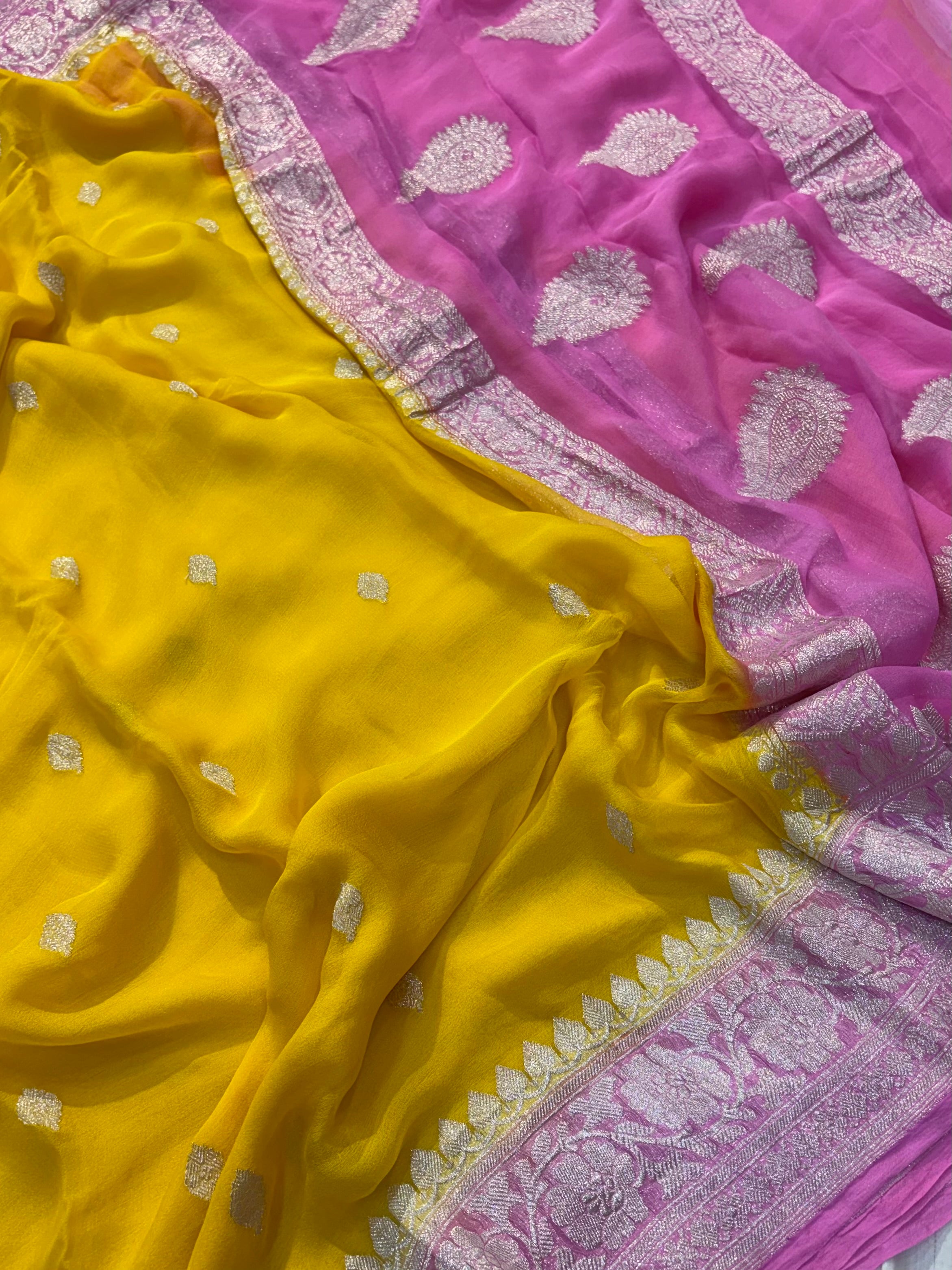 Pure khaddi chiffon saree in yellow with pink colour combination