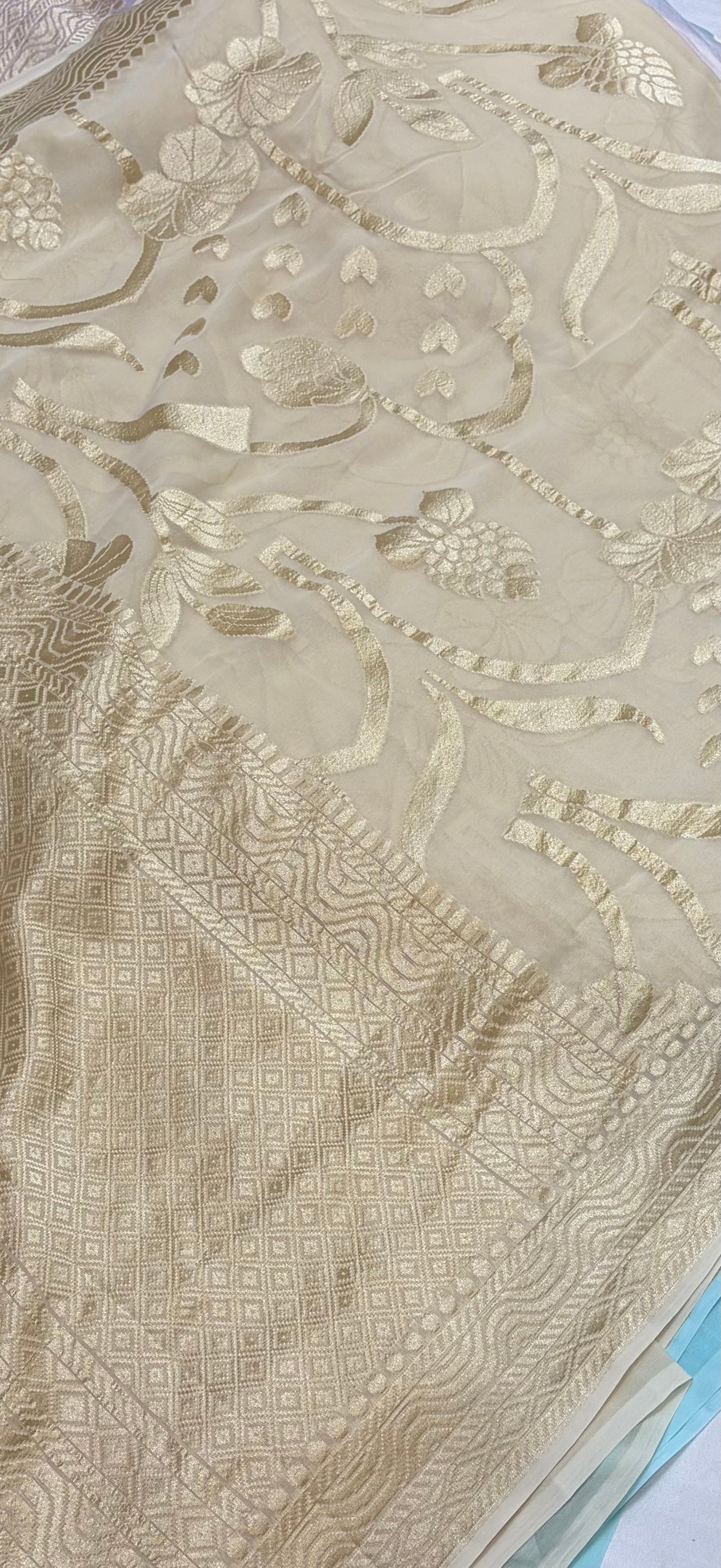 Pure georgette silk saree in pastel cream colour