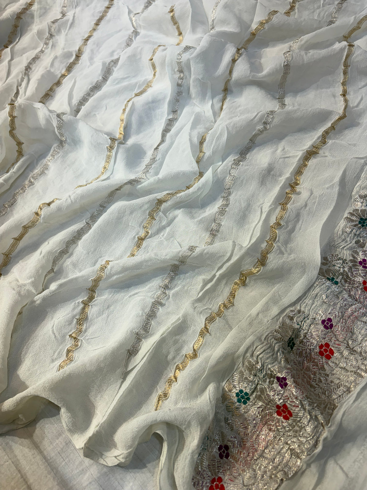 Pure handwoven meenakari khaddi chiffon saree in white colour