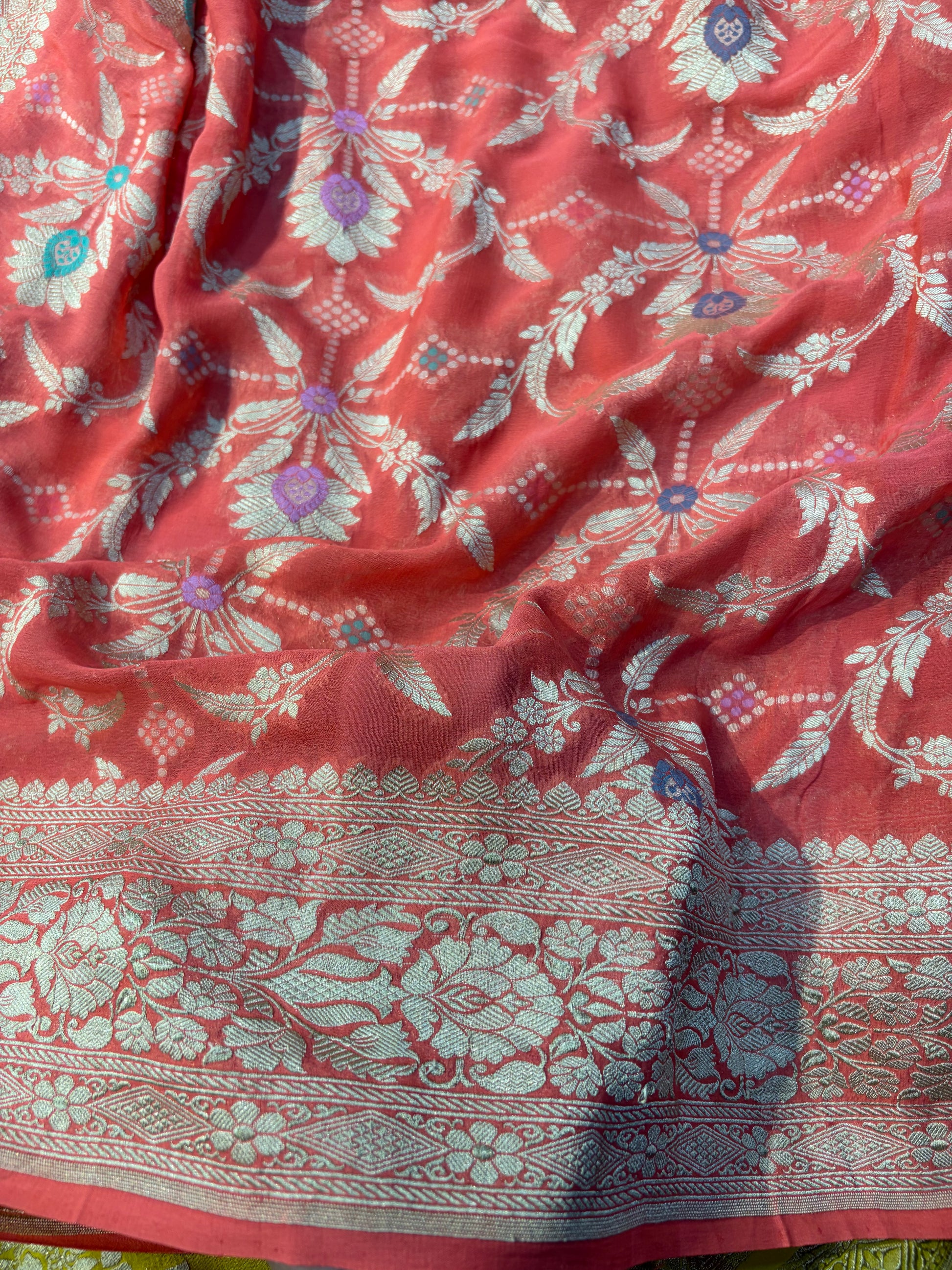 Premium Pure georgette silk sarees in beautiful peach orange colour with all over Meena work