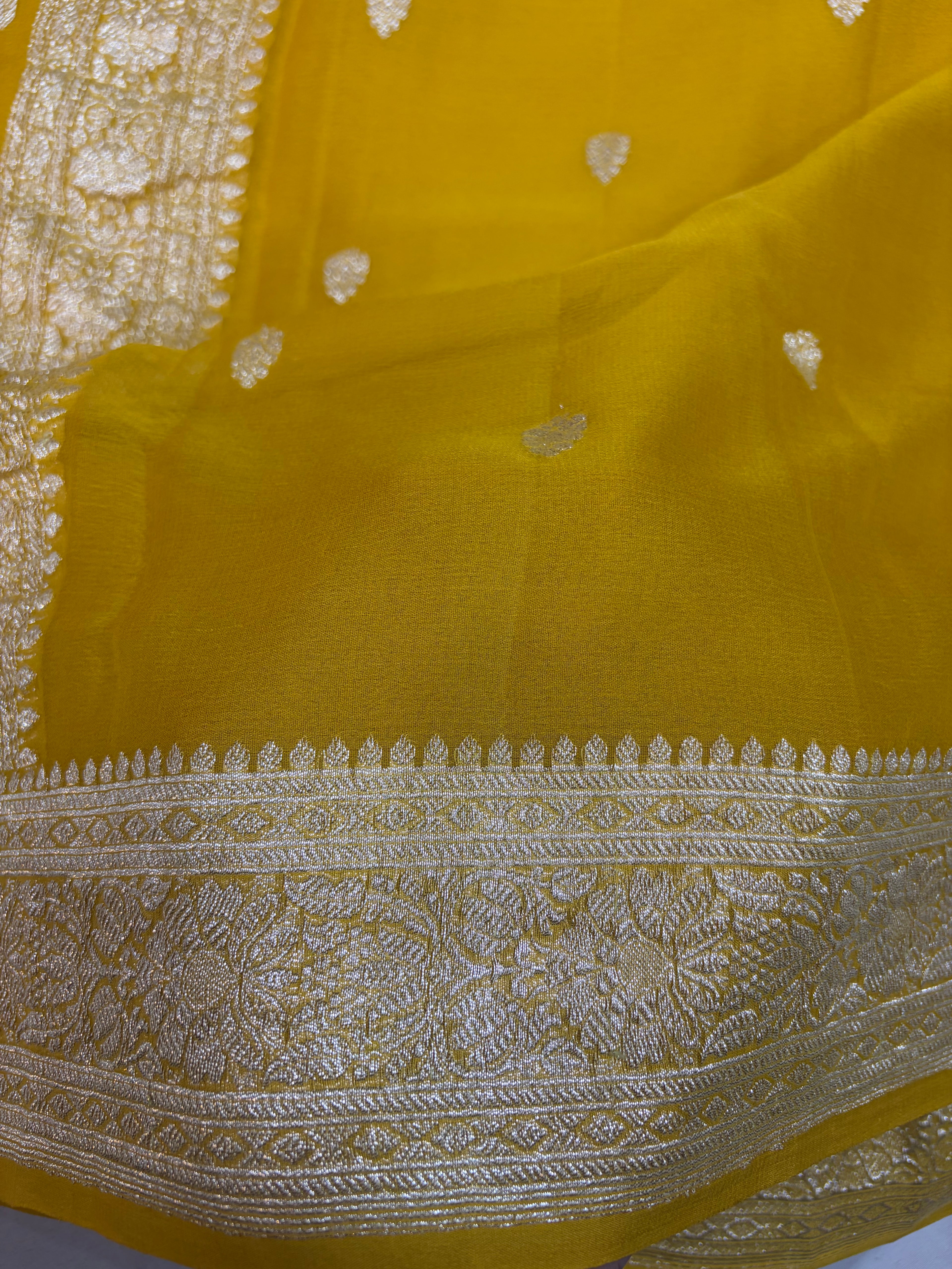 Pure khaddi chiffon saree in mustard gold colour