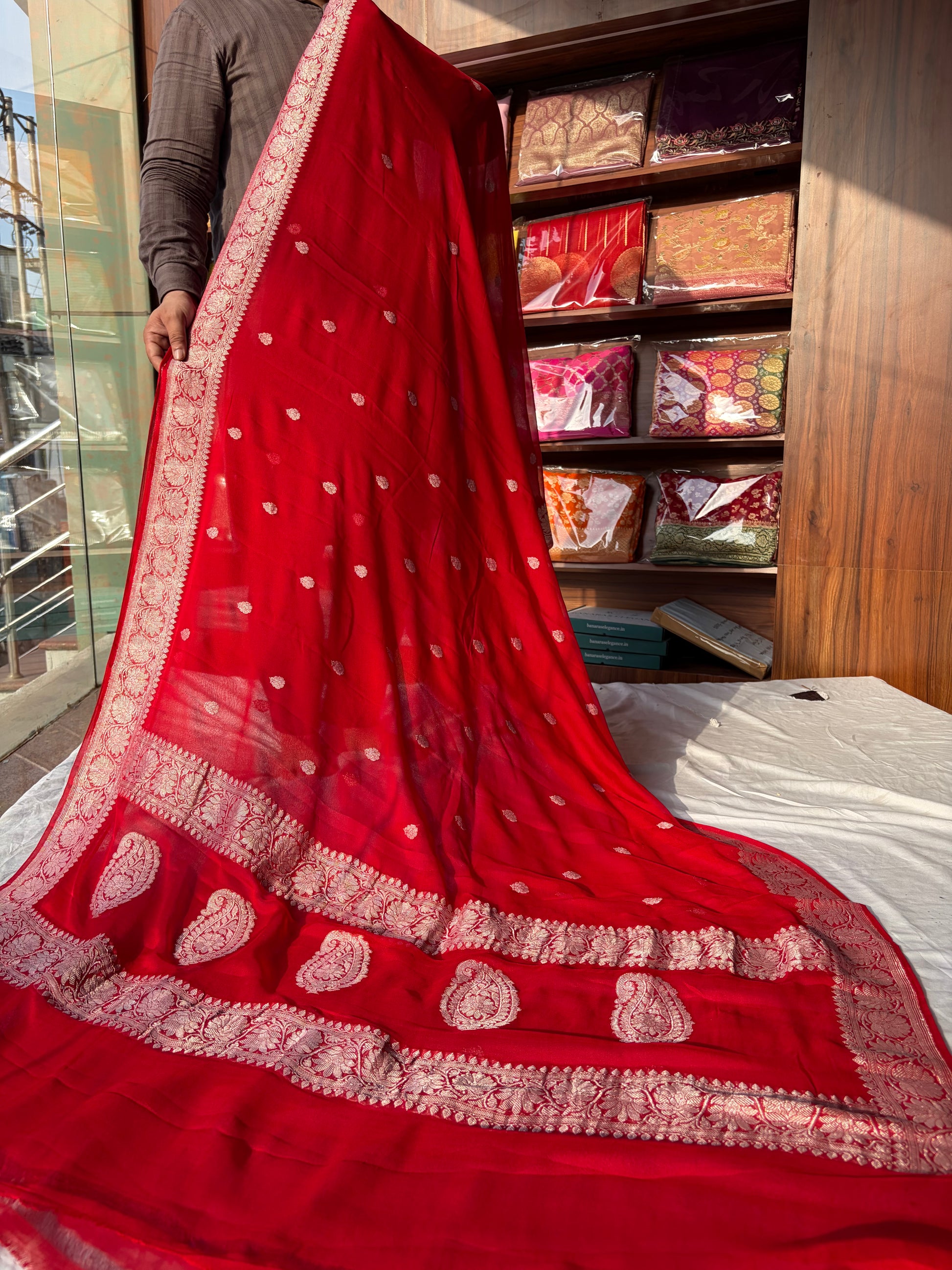 Pure khaddi chiffon saree in red colour