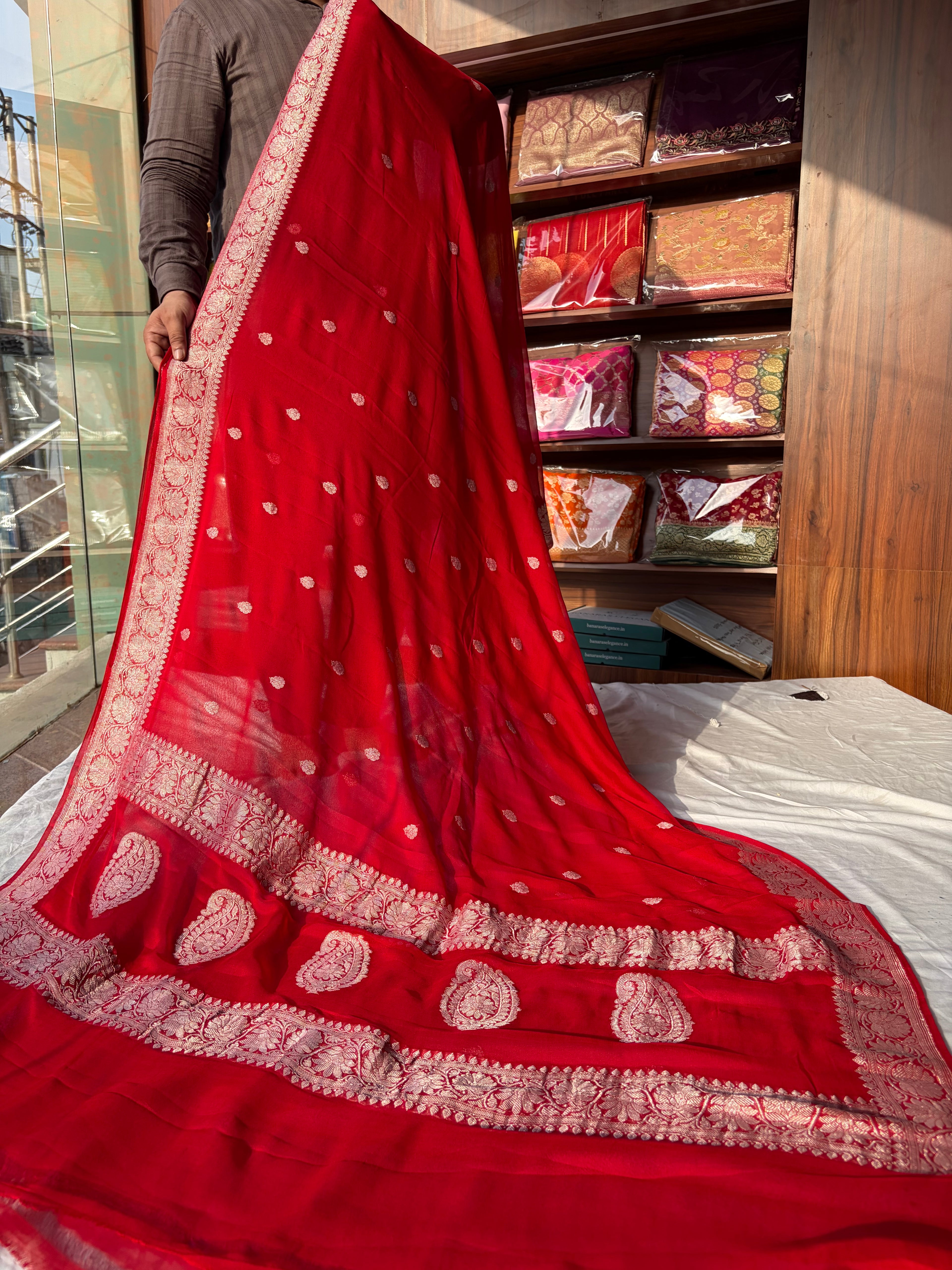 Pure khaddi chiffon saree in red colour