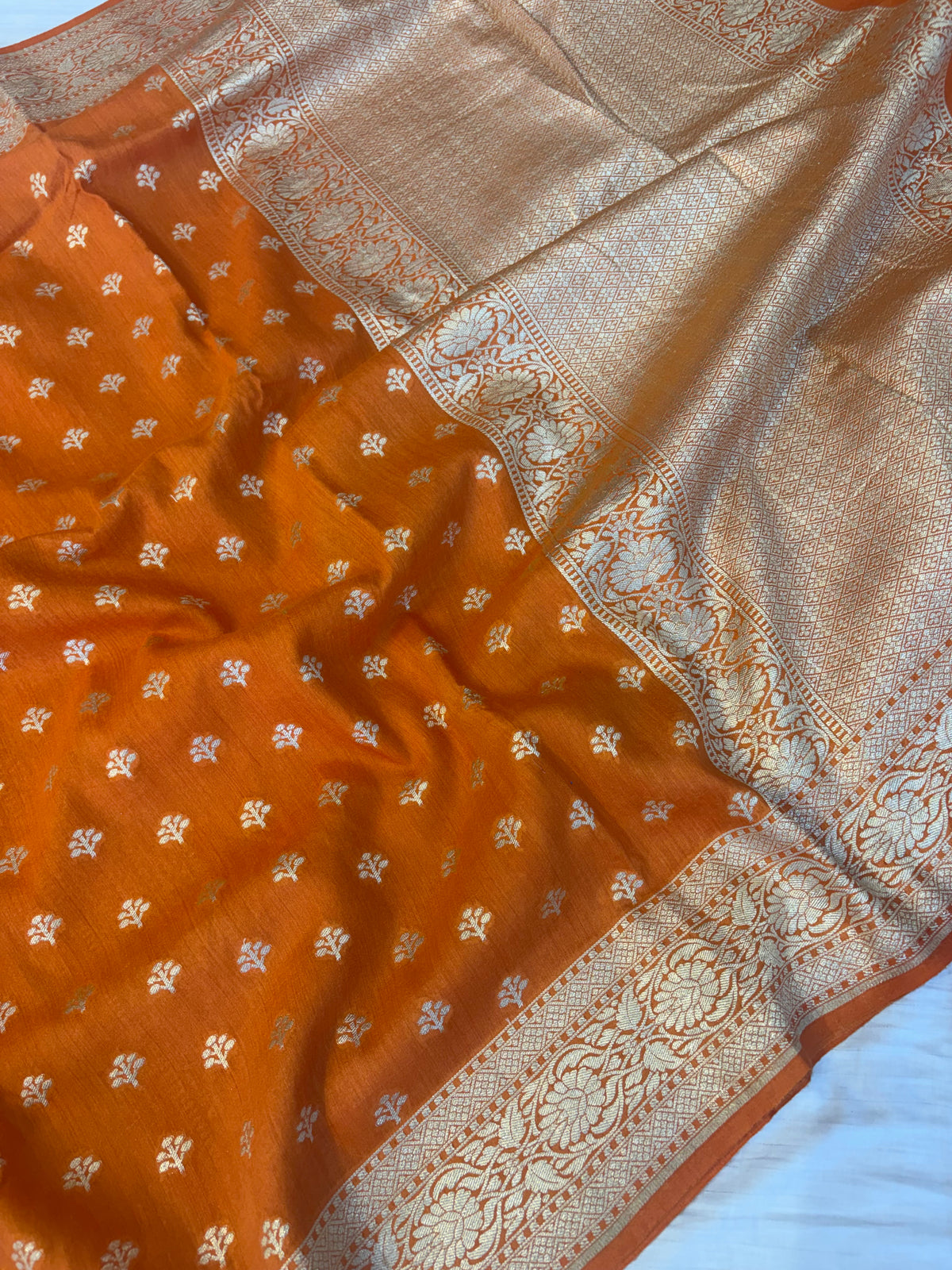 Pure moonga silk saree in orange colour