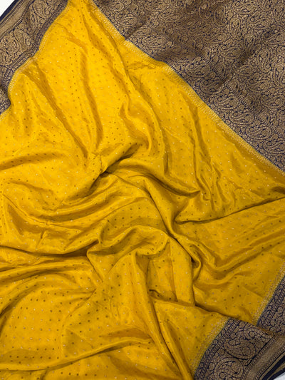Pure khaddi crepe silk saree in mustard yellow with dark navy blue colour