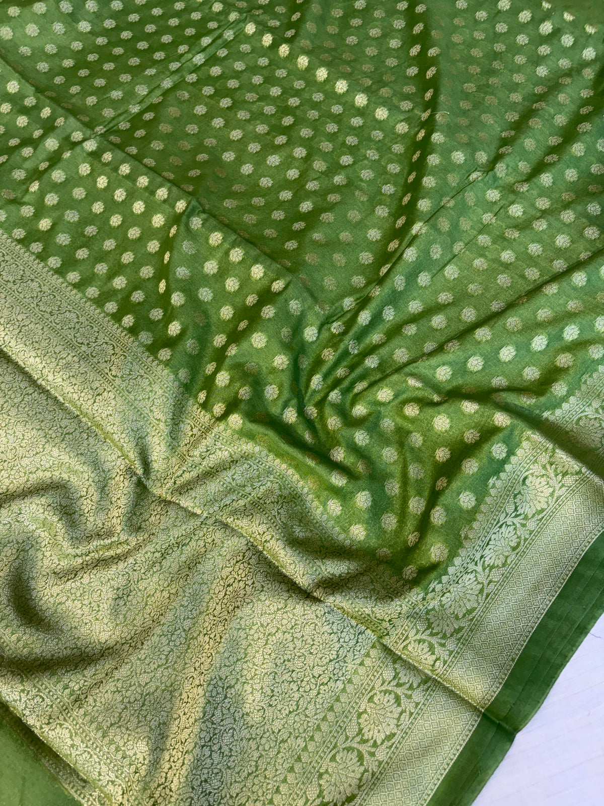 Banarasi georgette silk saree in dark pista green colour