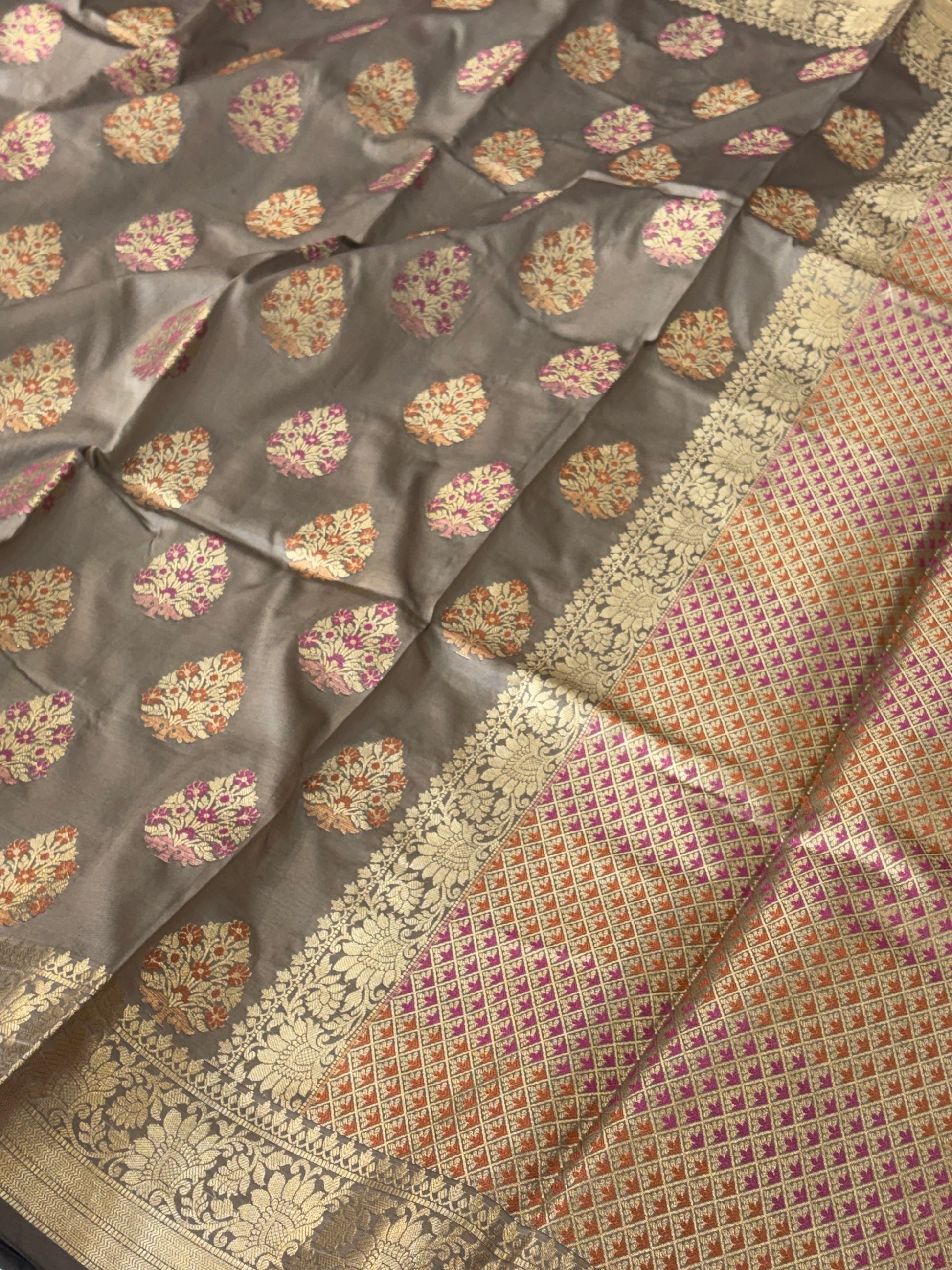 Banarasi katan by katan silk saree in dusty grey colour with multiple meenakari work