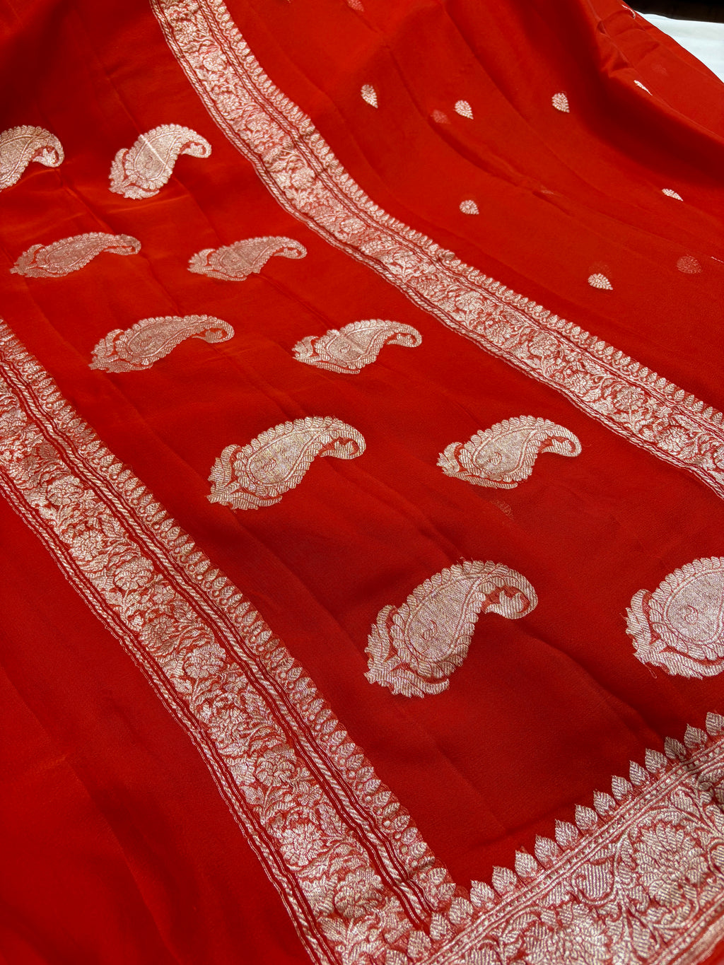 Pure khaddi chiffon saree in rust colour