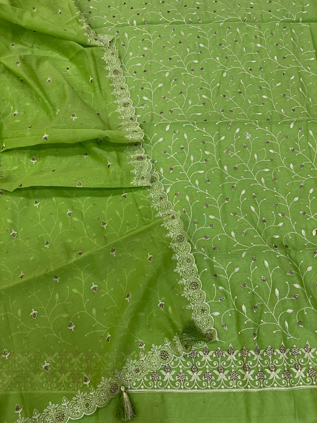 Banarasi pista green soft silk suit with all over embroidery work