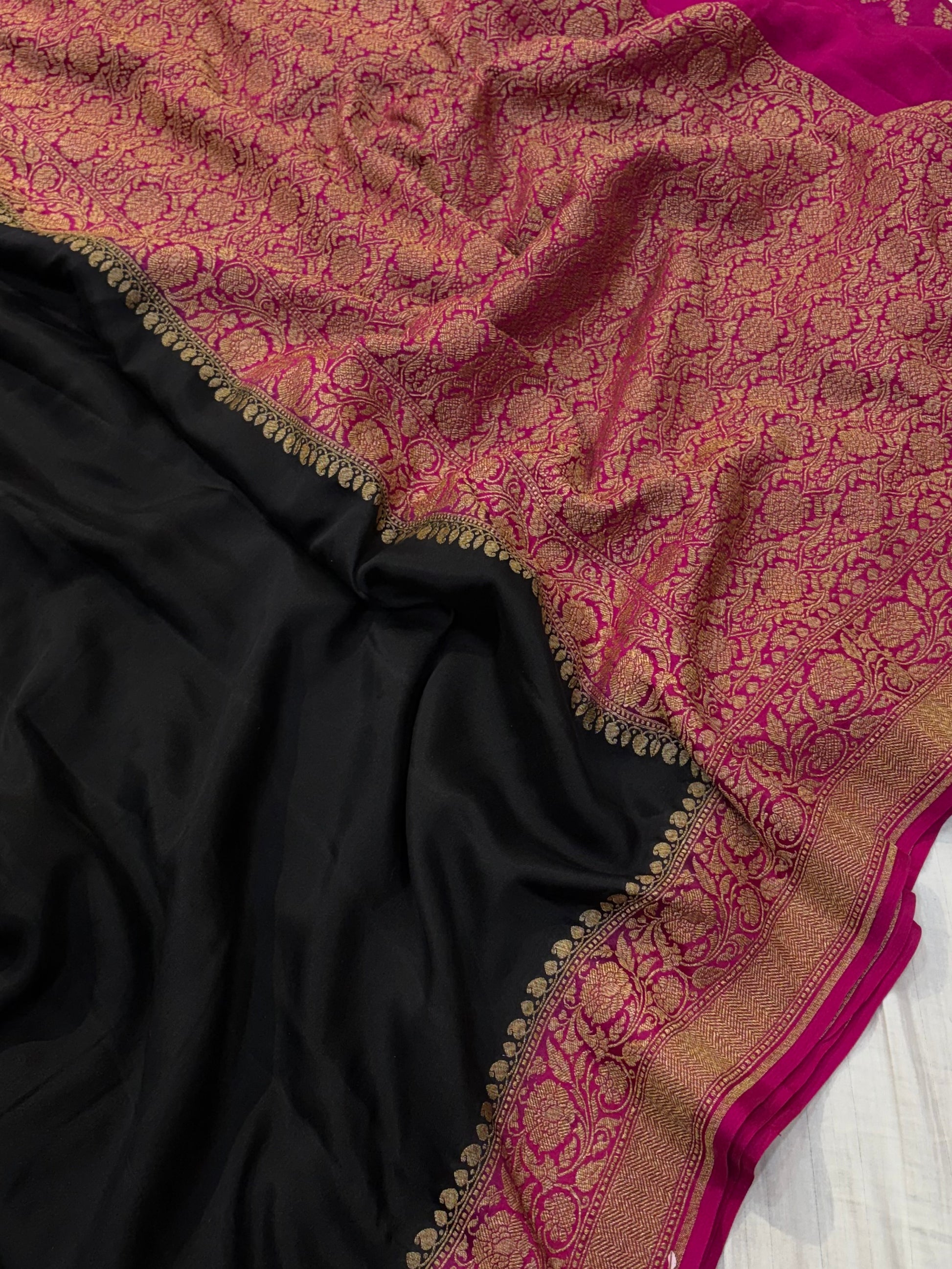 Pure khaddi crepe silk saree in black and Rani combination with pure antic zari work