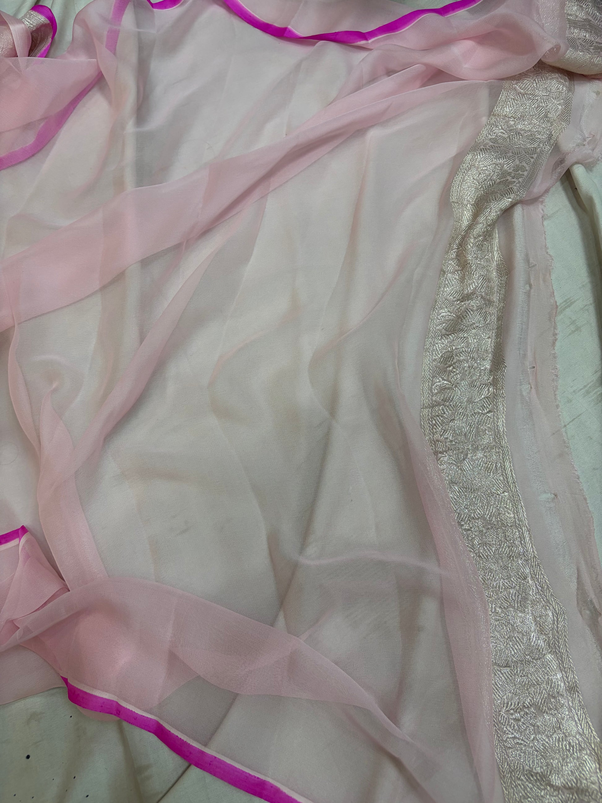 Pure khaddi chiffon saree in baby pink colour with Rani piping border