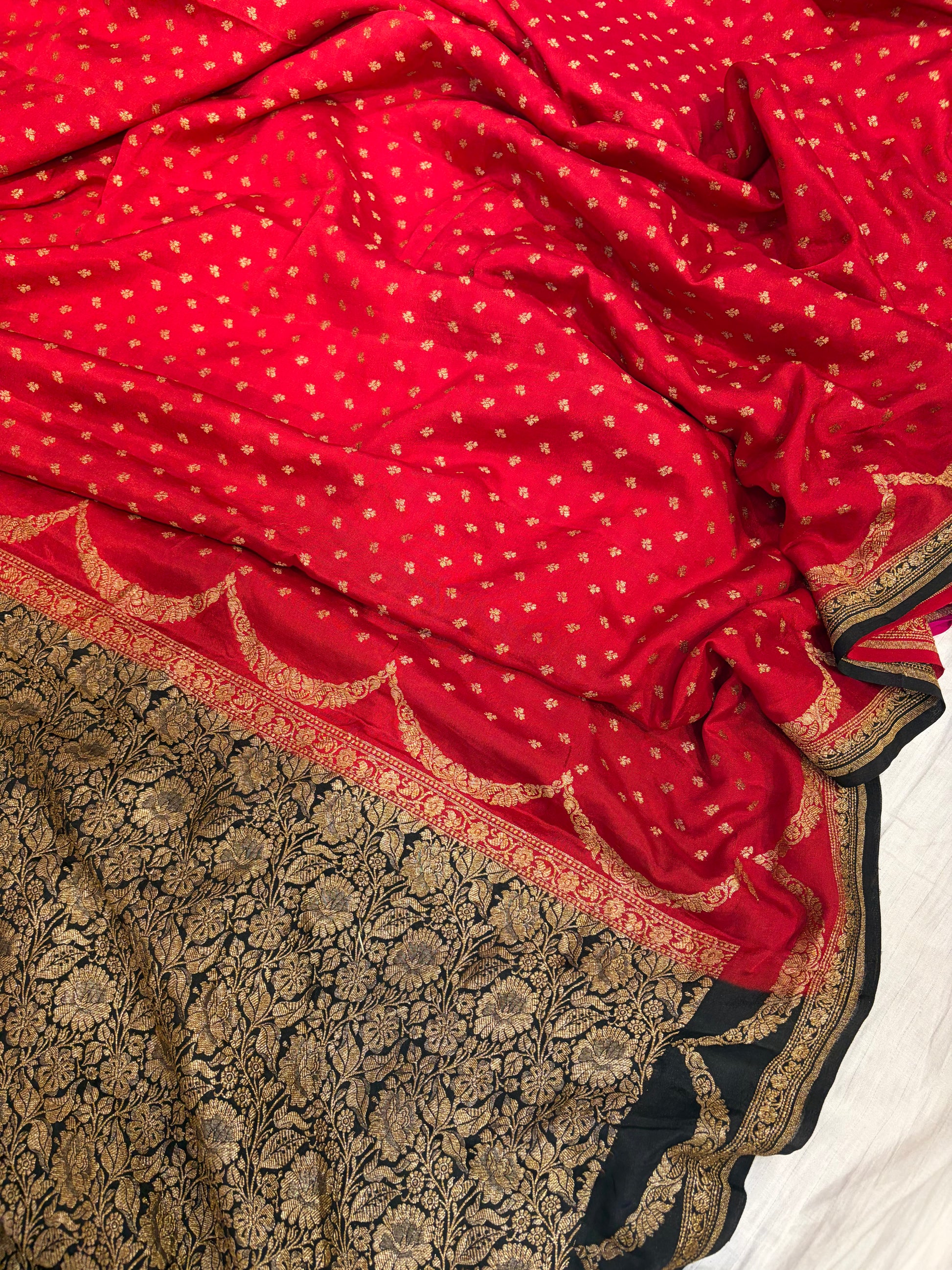 Pure khaddi crepe silk saree in red with black colour combination