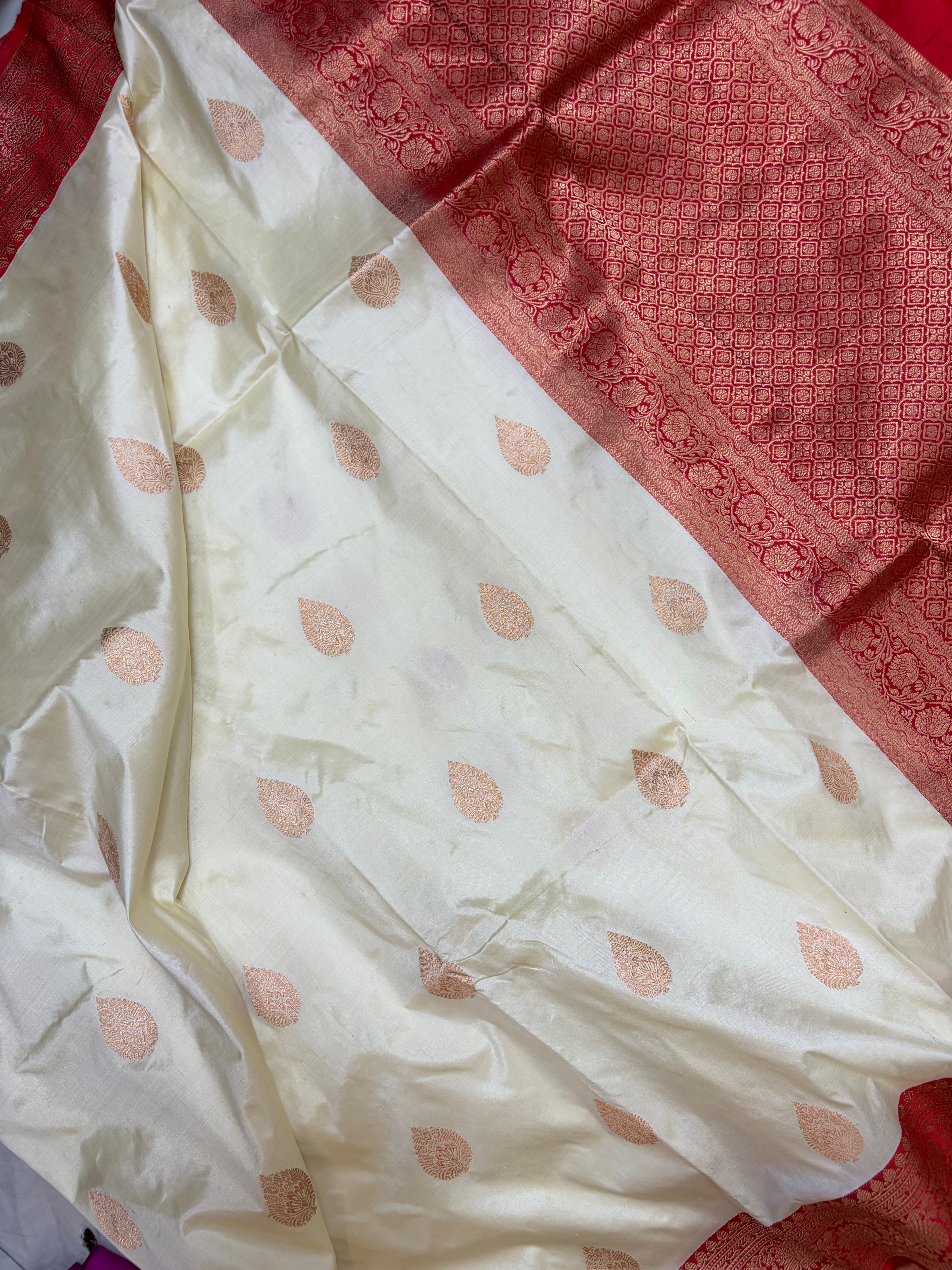 Pure handwoven katan silk saree in off white with red colour