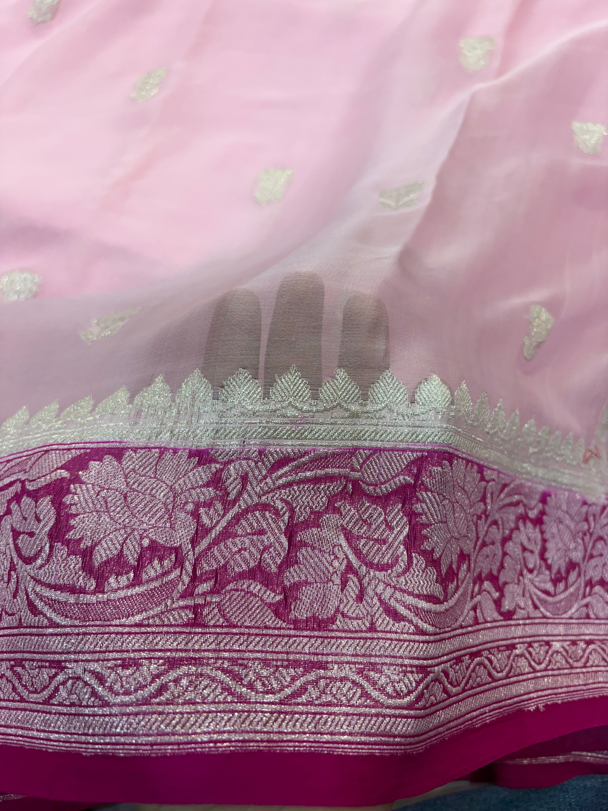 Pure khaddi chiffon saree in baby pink with Rani colour with tussles