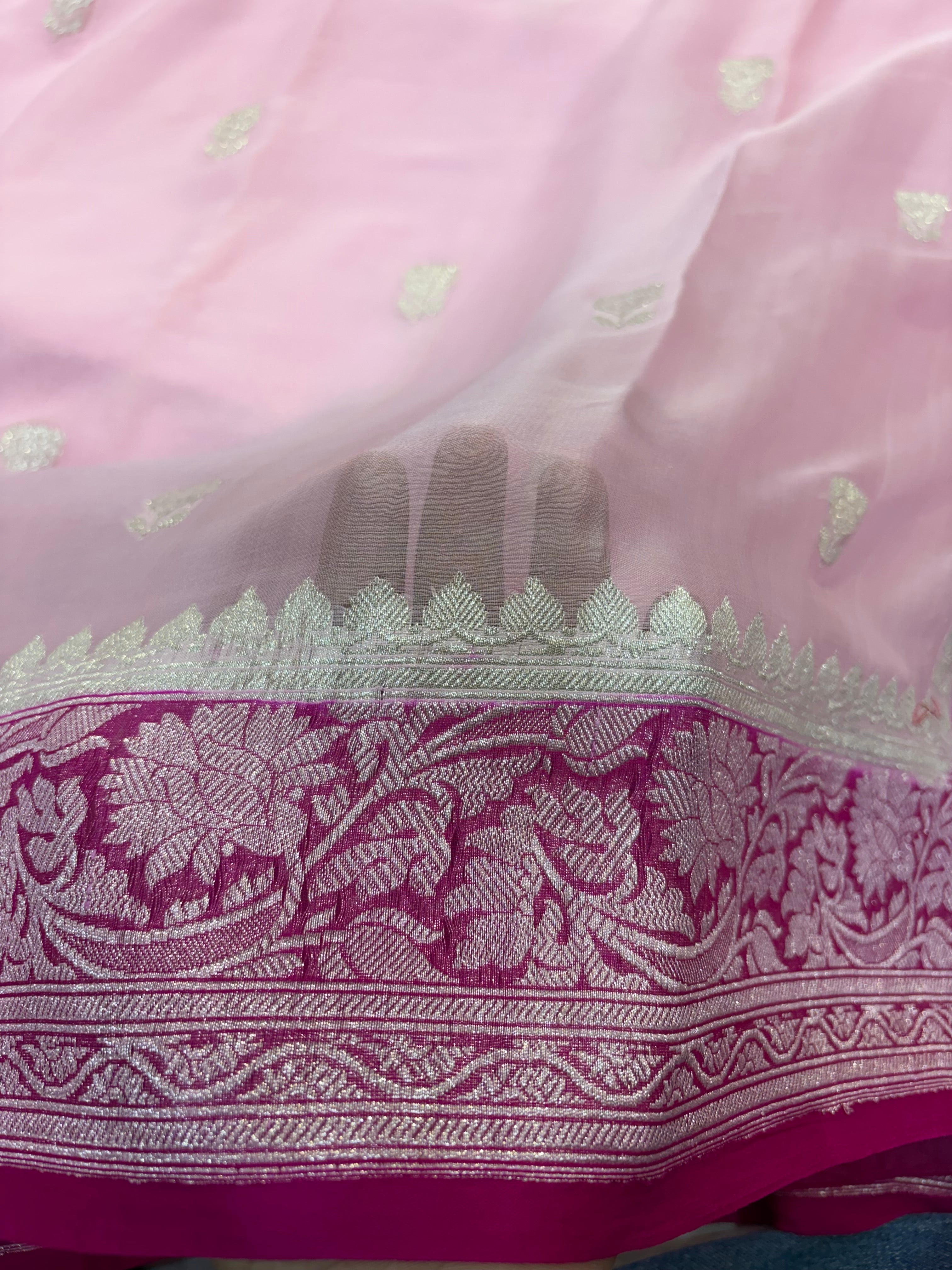 Pure khaddi chiffon saree in baby pink with Rani colour with tussles
