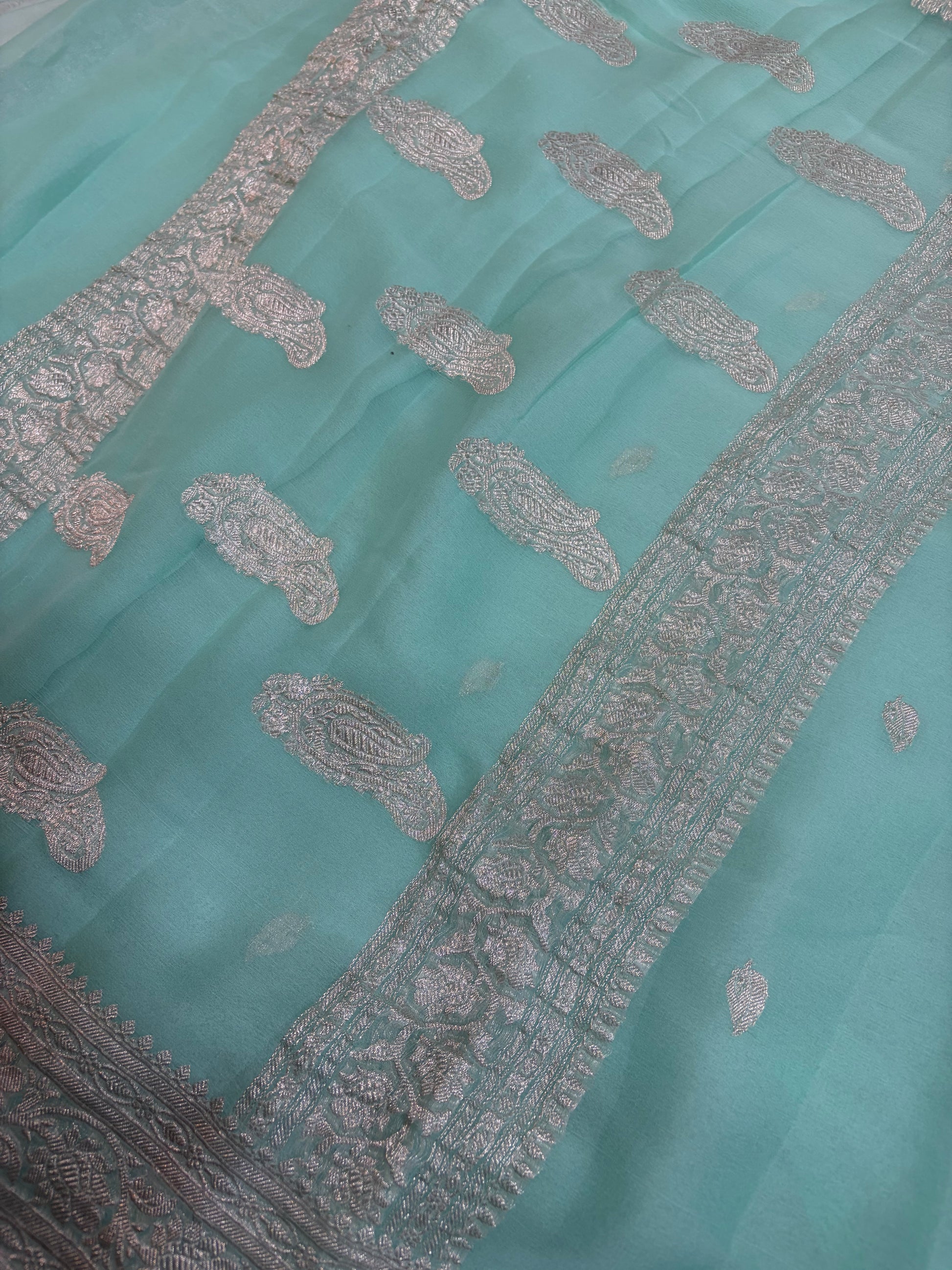 Pure khaddi chiffon saree in sea green colour