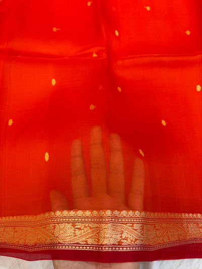 Pure handloom organza silk saree In orange colour with red piping border