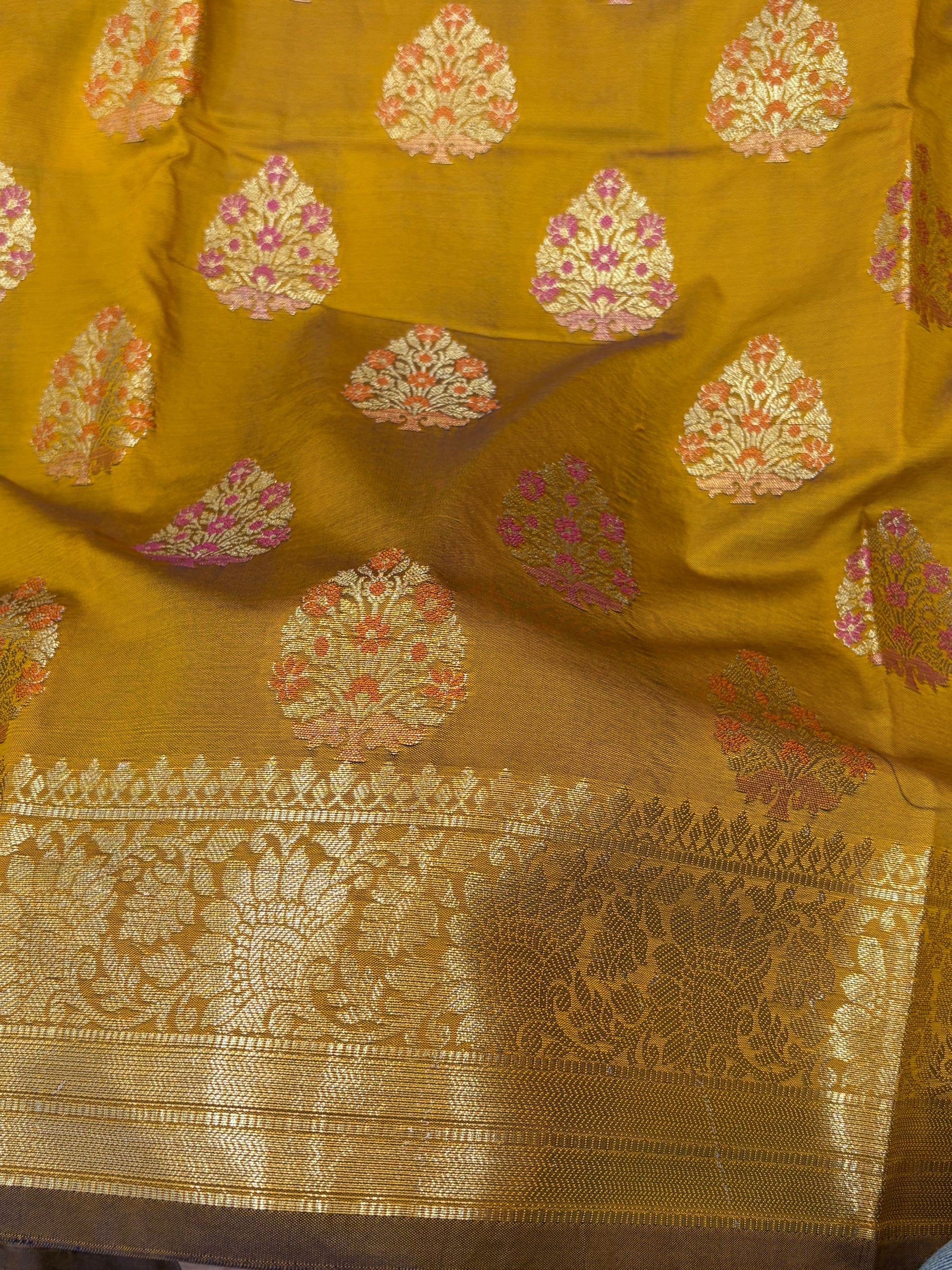 Banarasi katan by katan silk saree in mustard gold  colour with multiple meenakari work