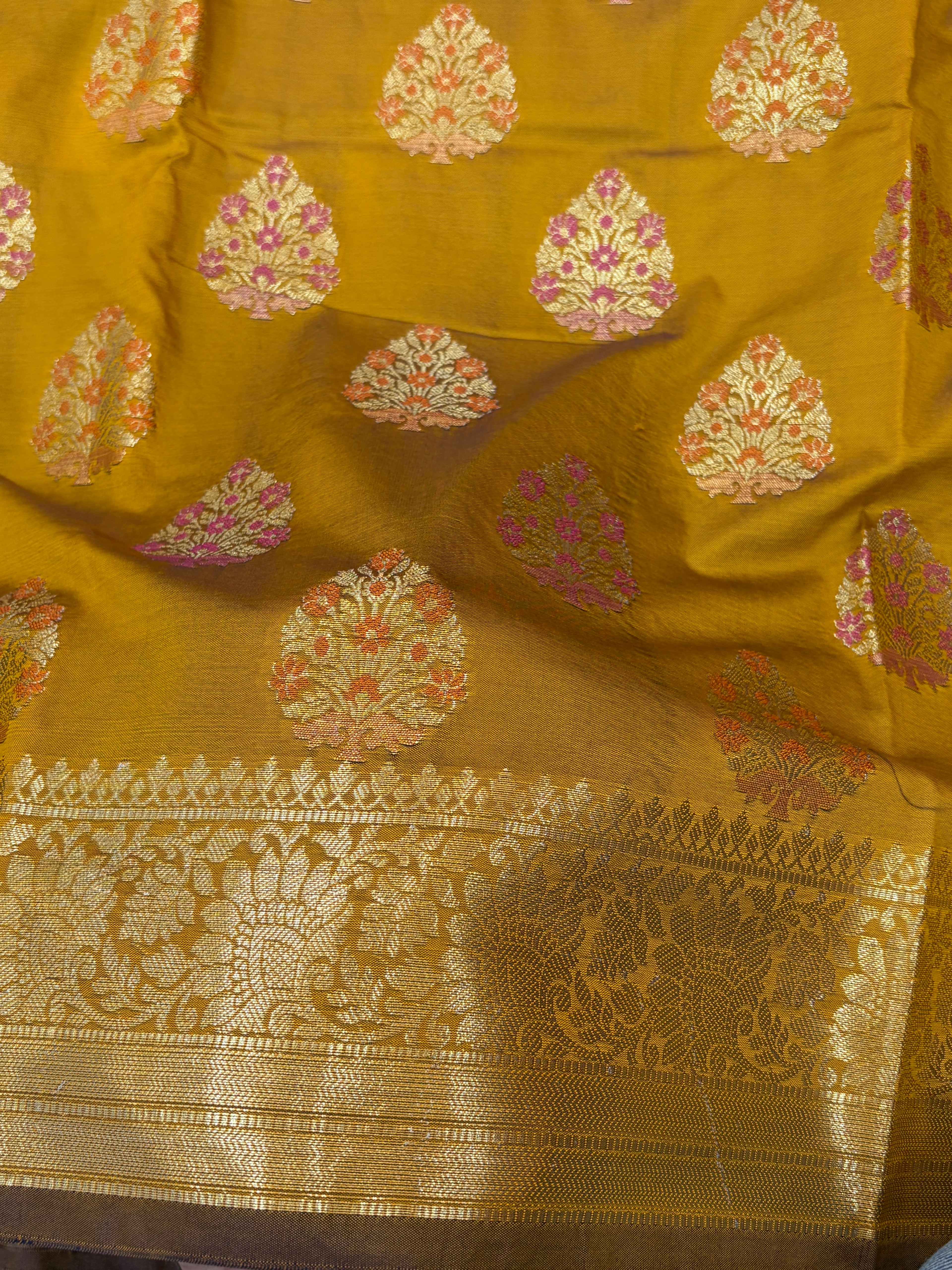 Banarasi katan by katan silk saree in mustard gold  colour with multiple meenakari work