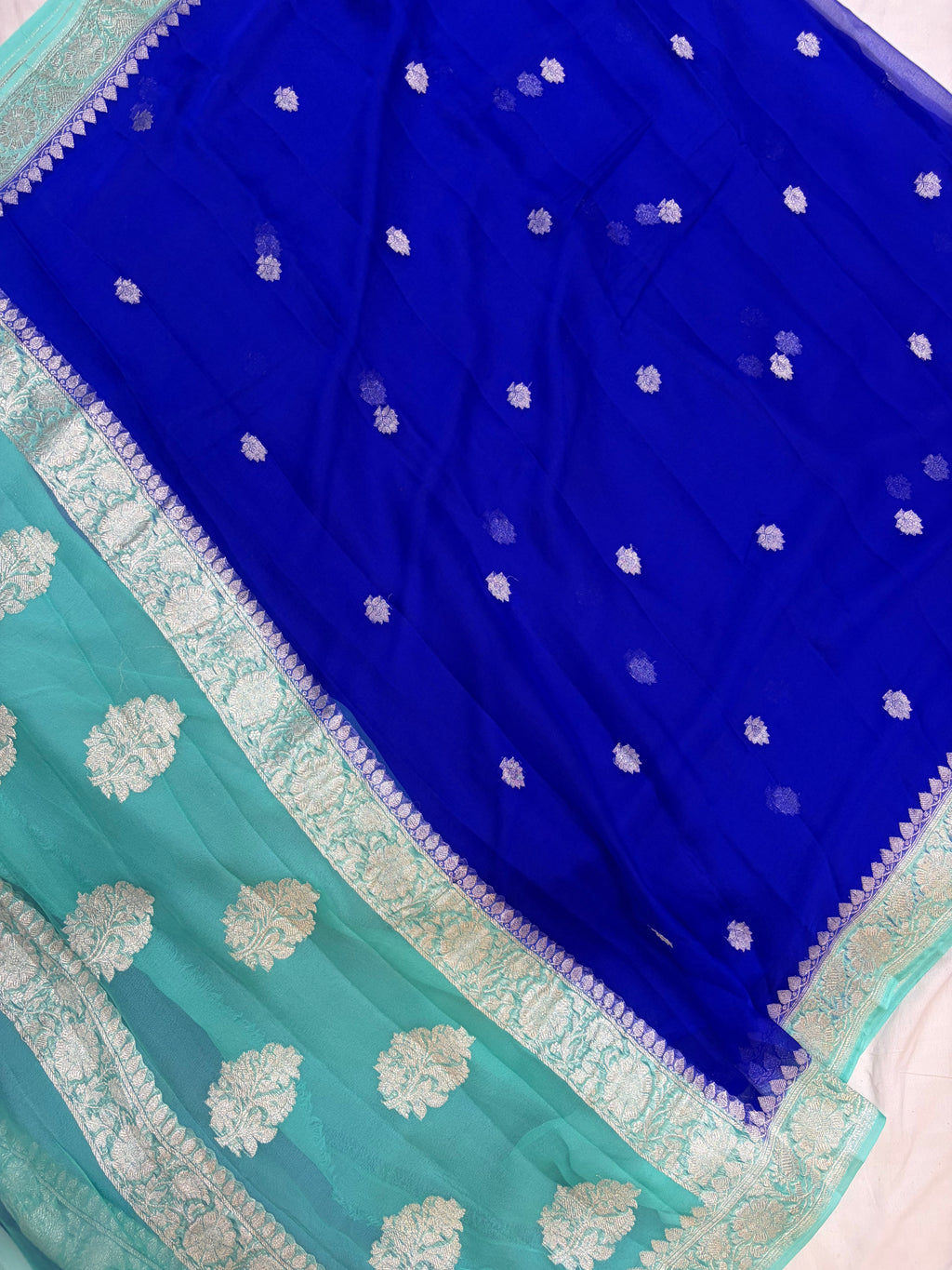 Pure khaddi chiffon saree in Royal blue and sea green colour