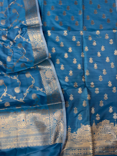 Banarasi soft silk suit in turquoise blue colour with temple design work