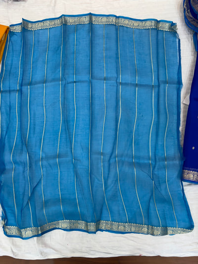 Pure handloom organza silk saree In Royal blue colour with Turquoise blue piping border