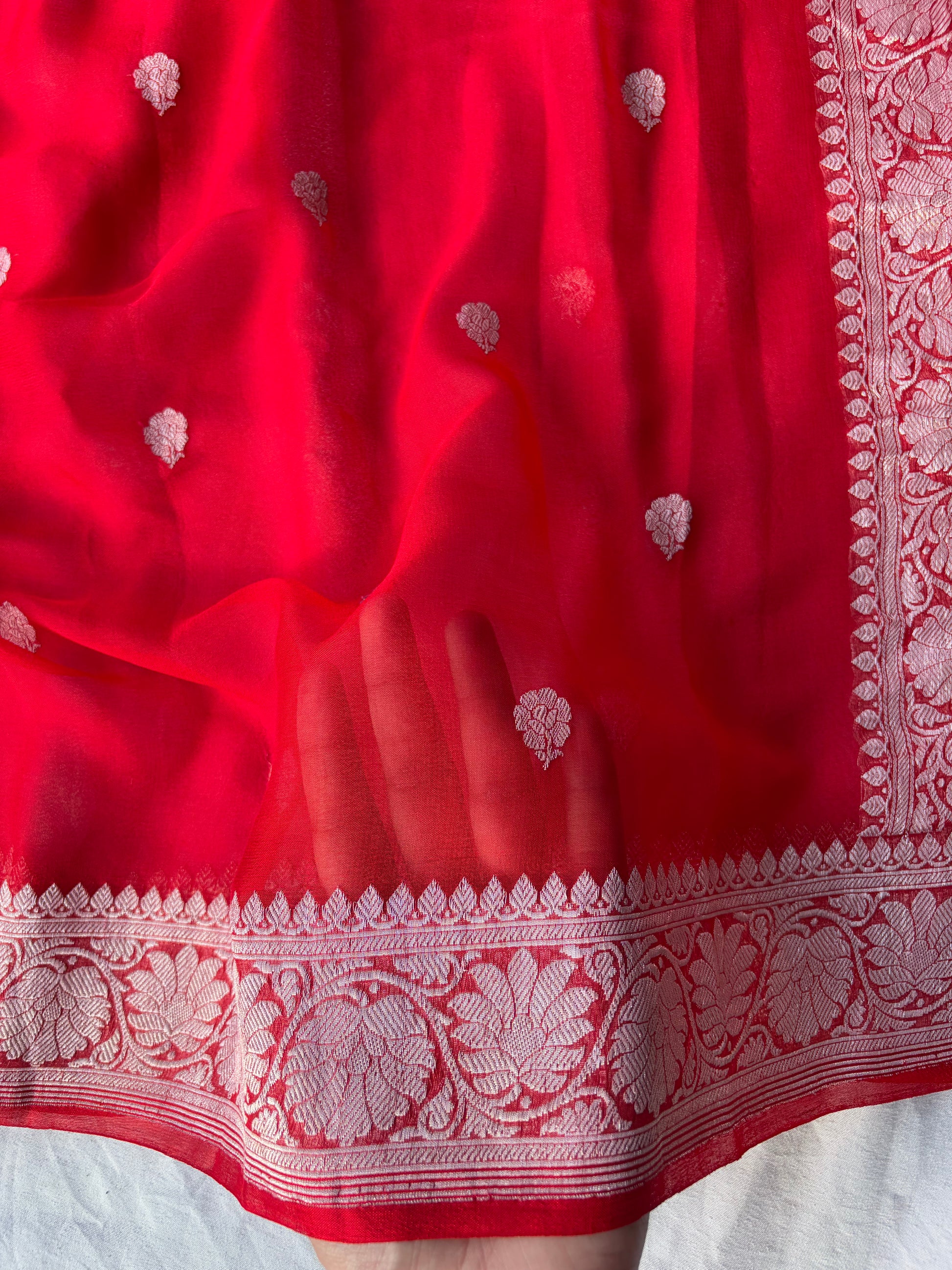 Pure khaddi chiffon saree in red colour