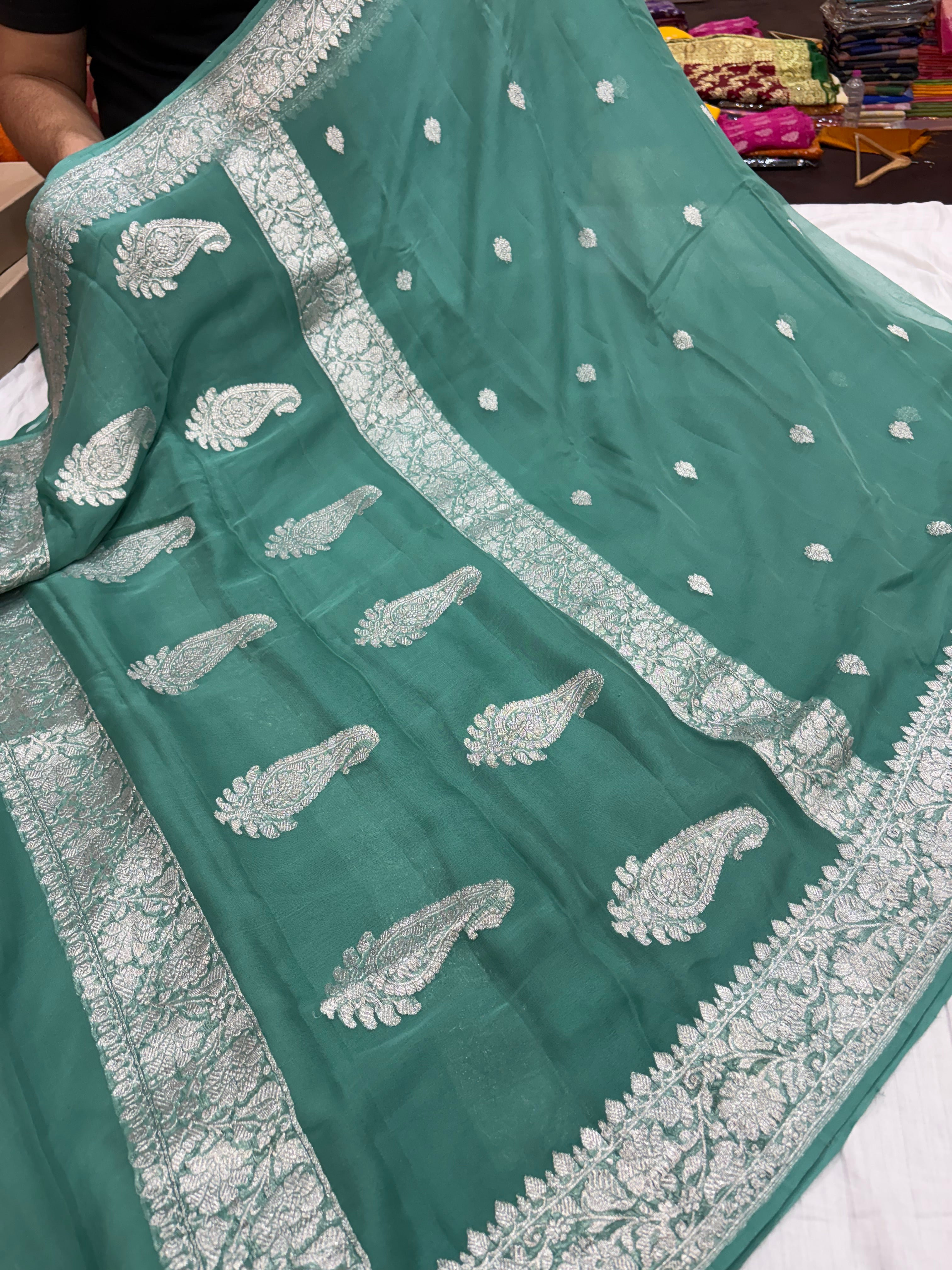 Pure khaddi chiffon saree in Teal green colour