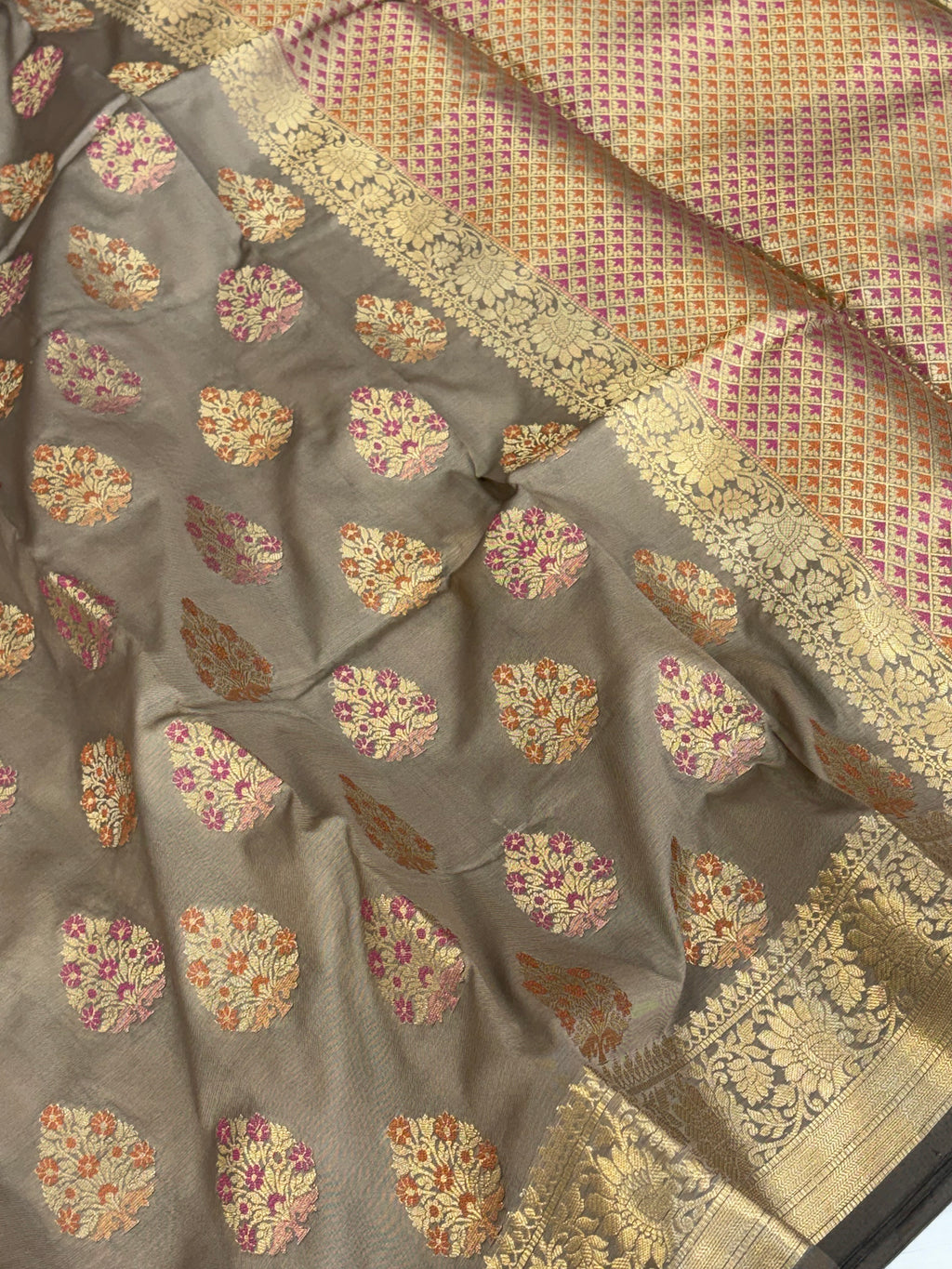 Banarasi katan by katan silk saree in dusty grey colour with multiple meenakari work