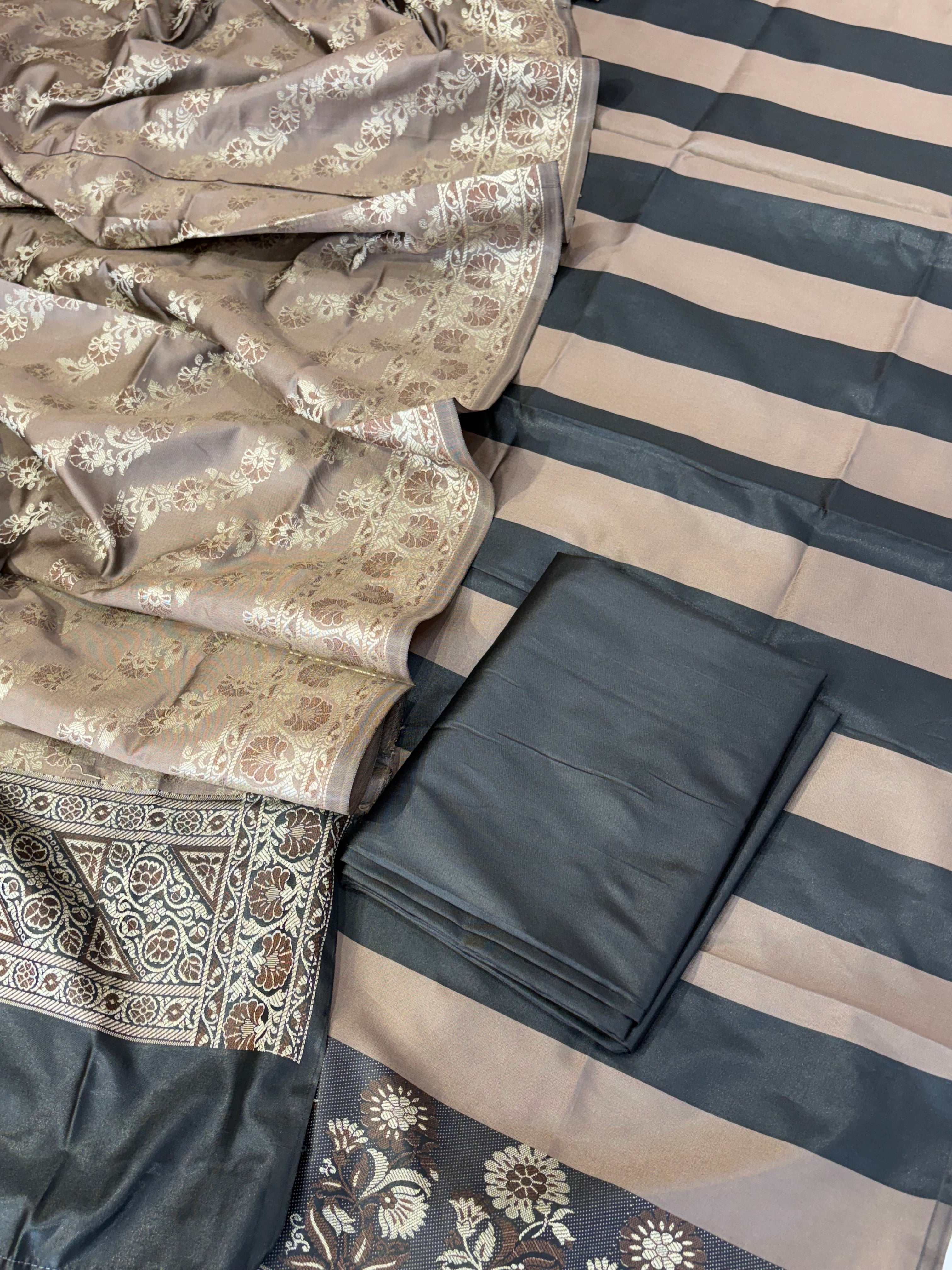 Banarasi soft silk suit in black with mushroom brown colour combination with tussels