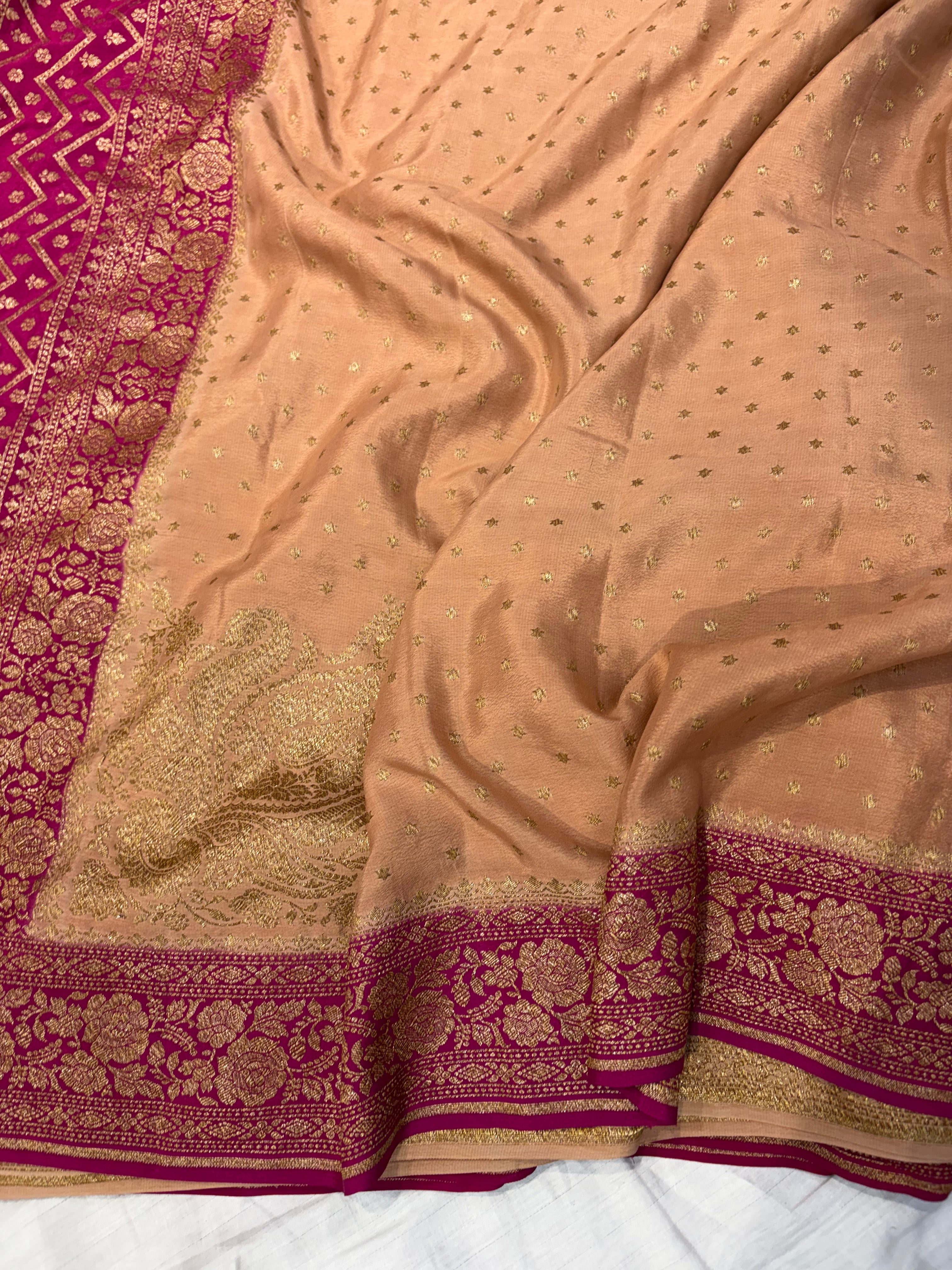 Pure khaddi crepe silk saree in Peach with rani pink colour