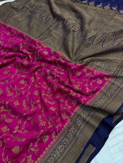Pure khaddi crepe silk saree with all over jaal work in Rani with navy blue colour combination
