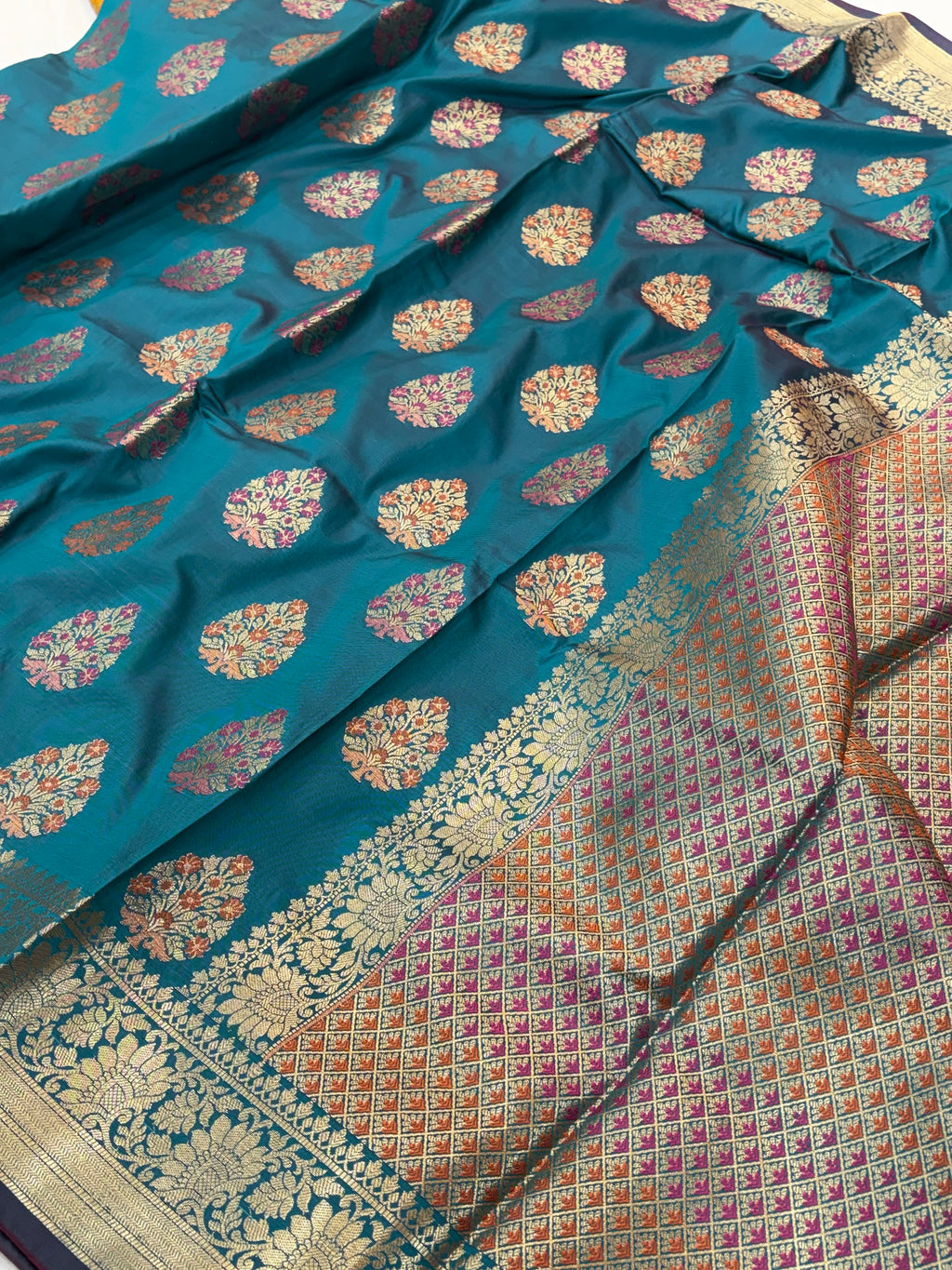 Banarasi katan by katan silk saree in Rama green colour with multiple meenakari work