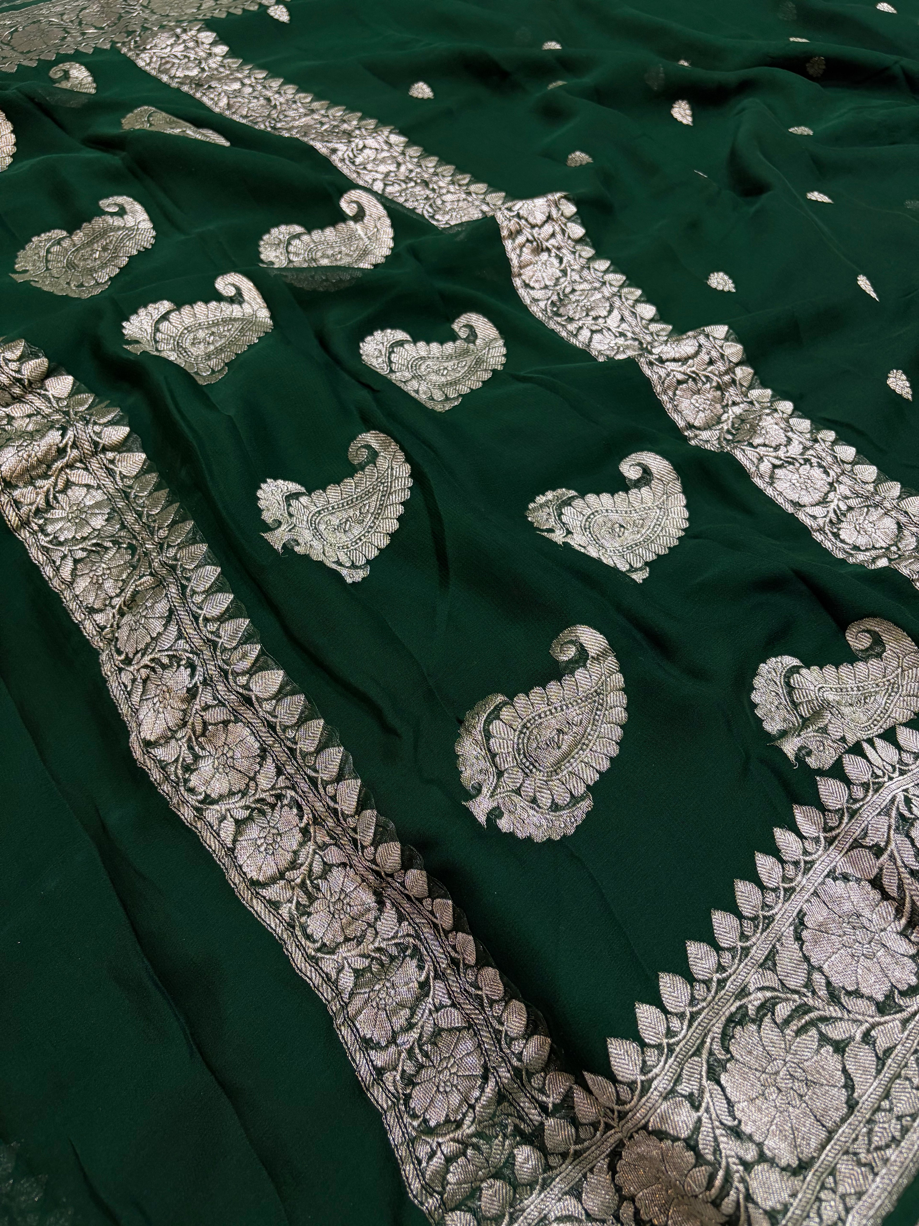 Pure Banarasi Khaddi Chiffon Zari Border Saree in bottle green colour