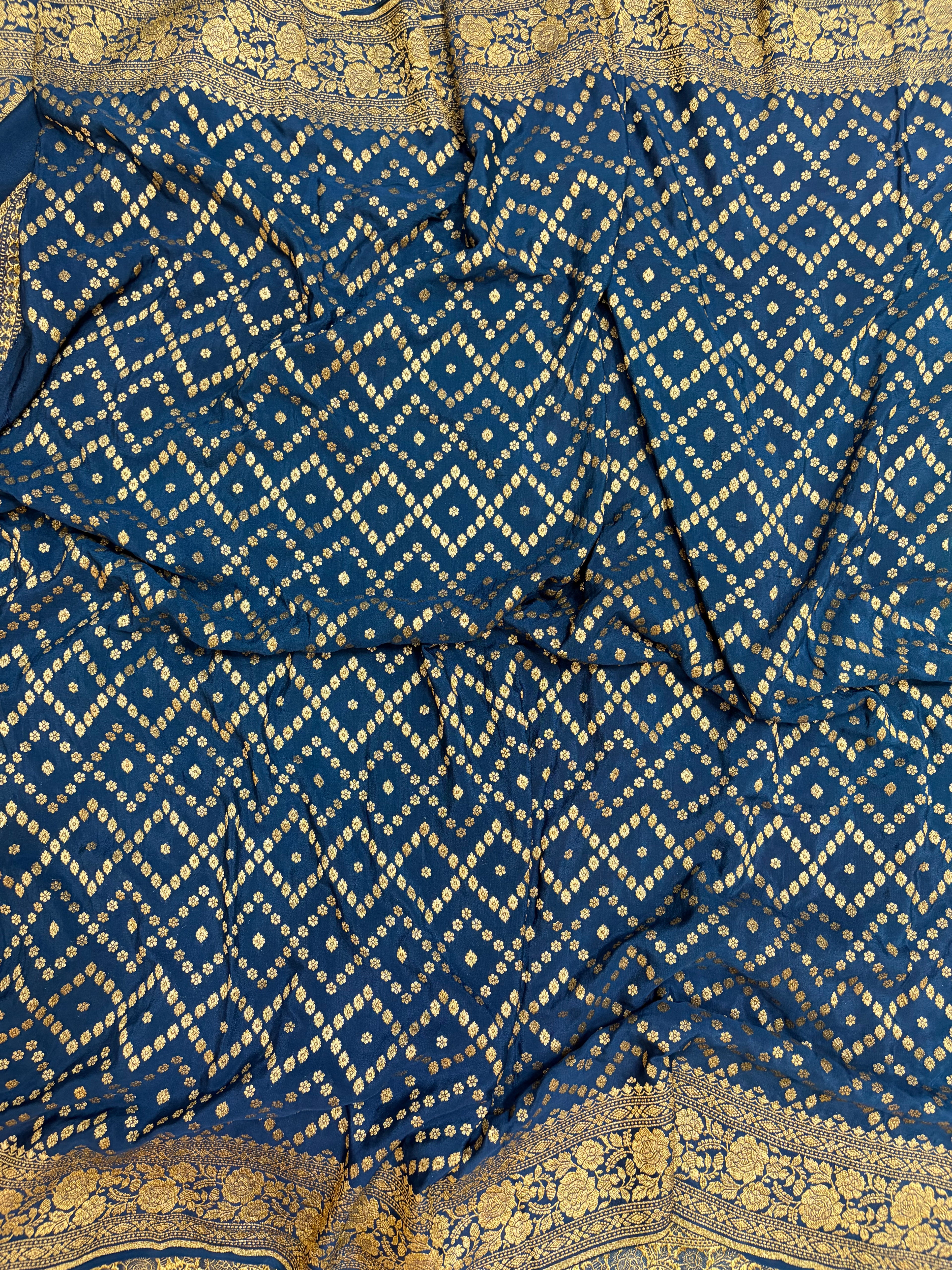 Pure khaddi crepe silk saree in peach & German blue colour