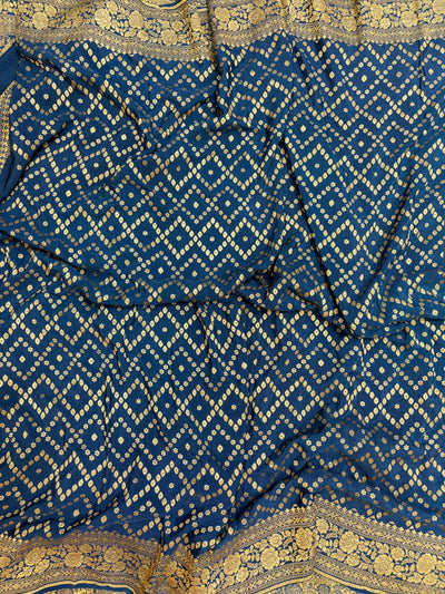 Pure khaddi crepe silk saree in peach & German blue colour